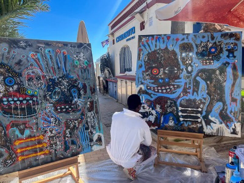 M&eacute;d&eacute;ric Turay in his studio, working on Can I Tell You a Secret (2024)