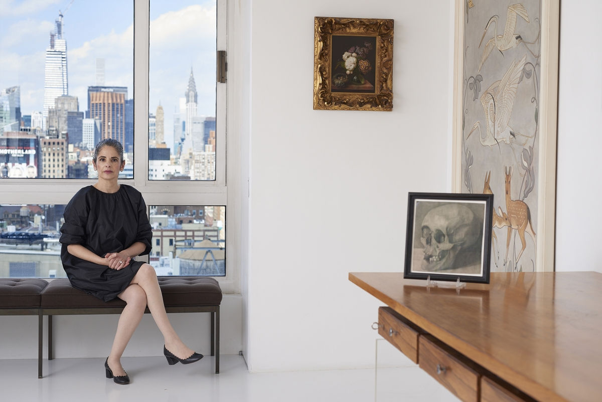 Photo of Mireille Mosler with artworks