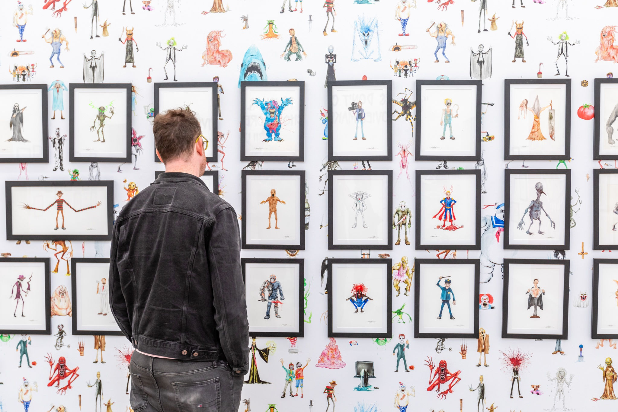 A group of people at the opening reception of Alex Pardee's exhibition at Harman Projects Los Angeles