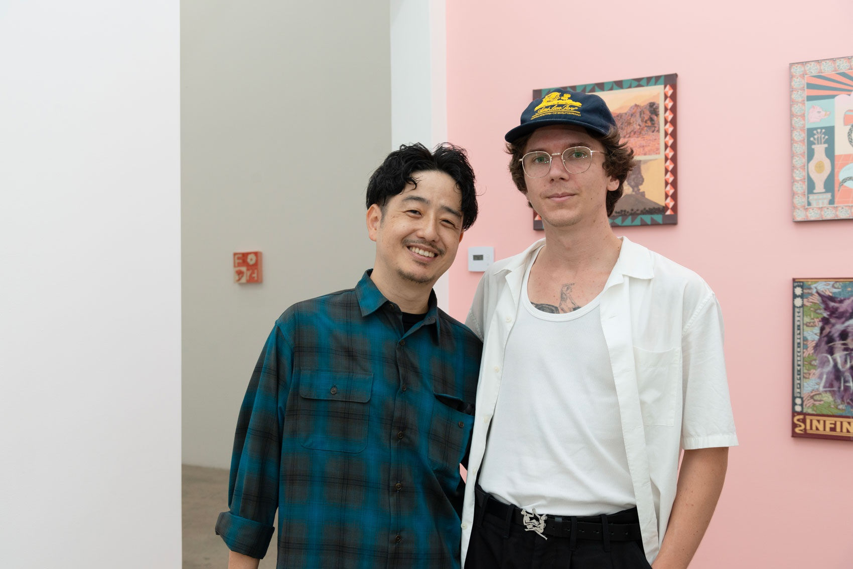 Artist Jun Oson and Keya Tama at the opening reception in Los Angeles