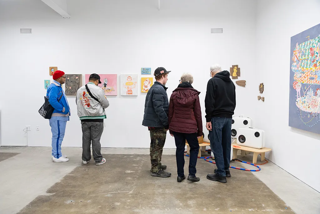 Photo from the opening reception of artist duo KeFe's opening reception for their show Music Island.