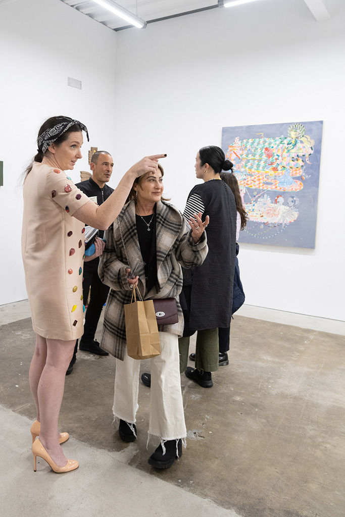 Photo from the opening reception of artist duo KeFe's opening reception for their show Music Island.