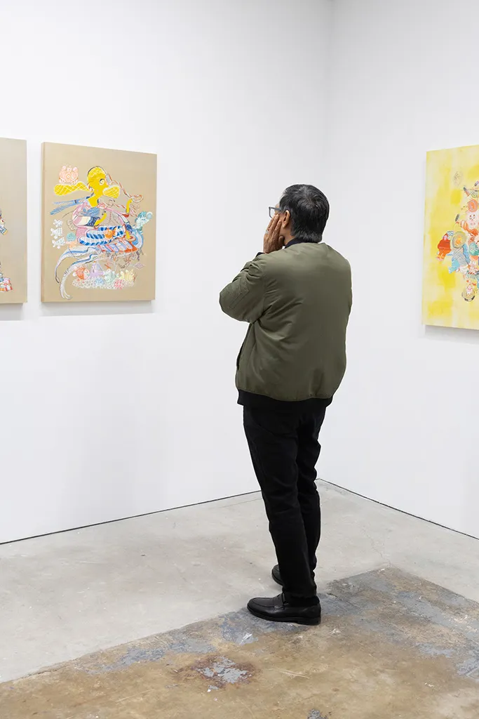 Photo from the opening reception of artist duo KeFe's opening reception for their show Music Island.