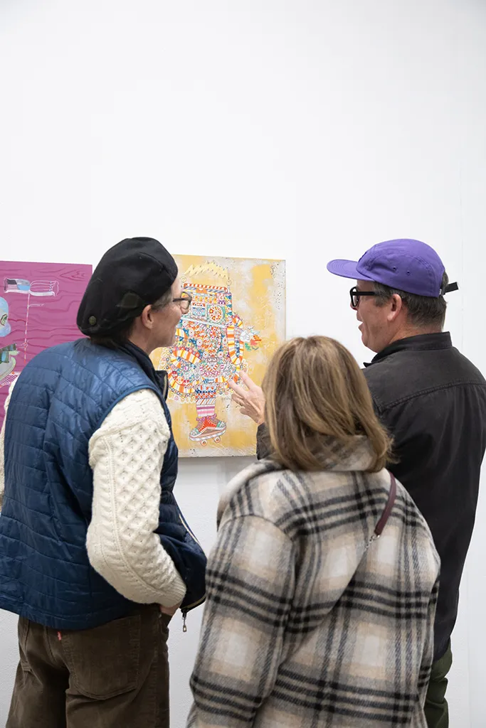 Photo from the opening reception of artist duo KeFe's opening reception for their show Music Island.