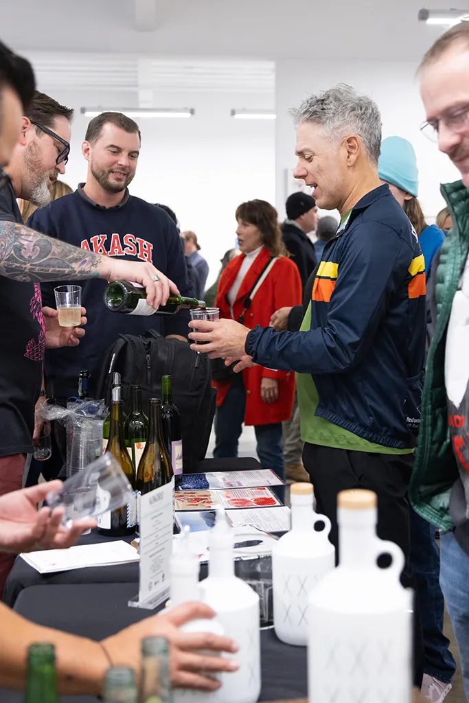 Photo from the opening reception of artist duo KeFe's opening reception for their show Music Island.