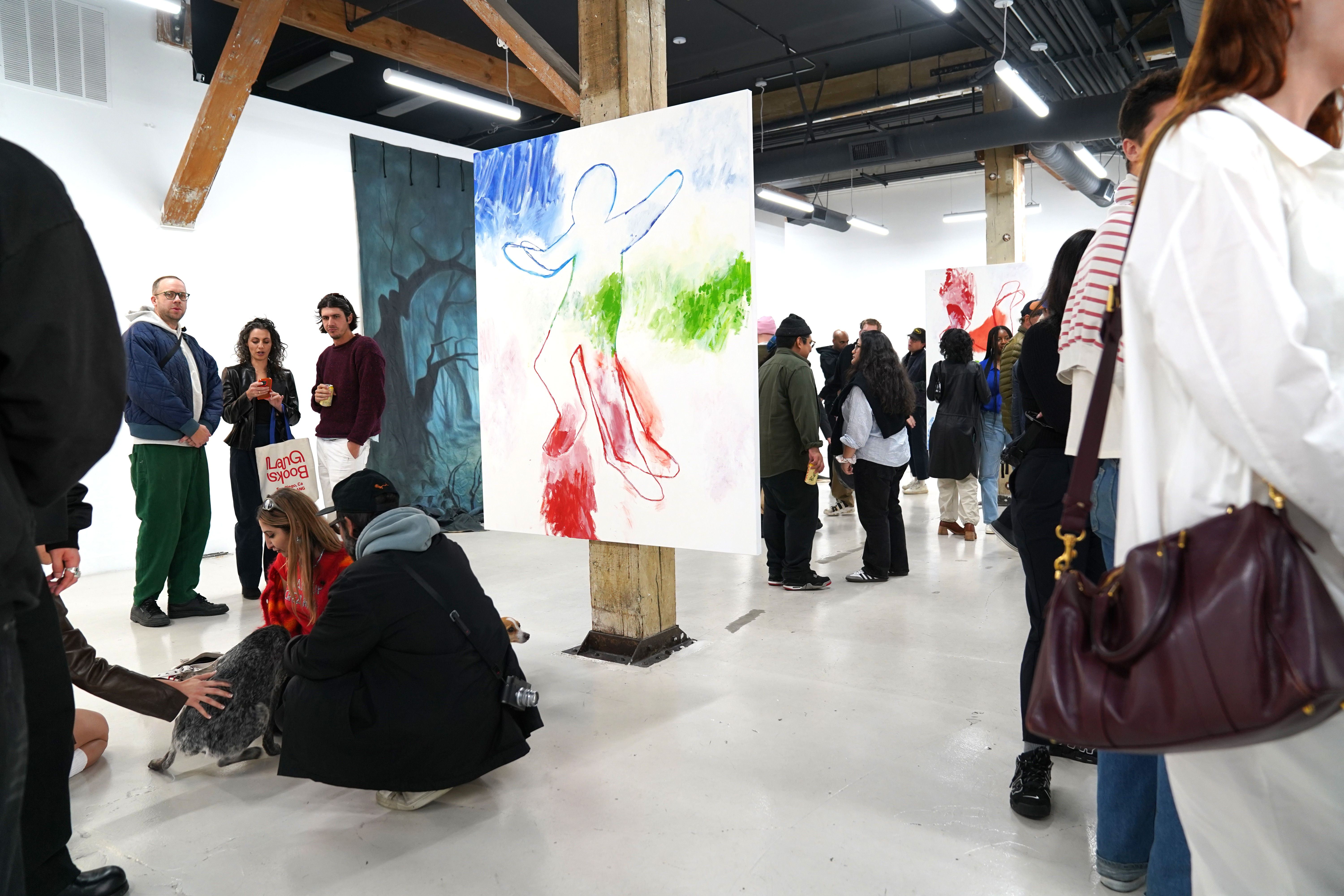photo of a crowd of people in the art gallery
