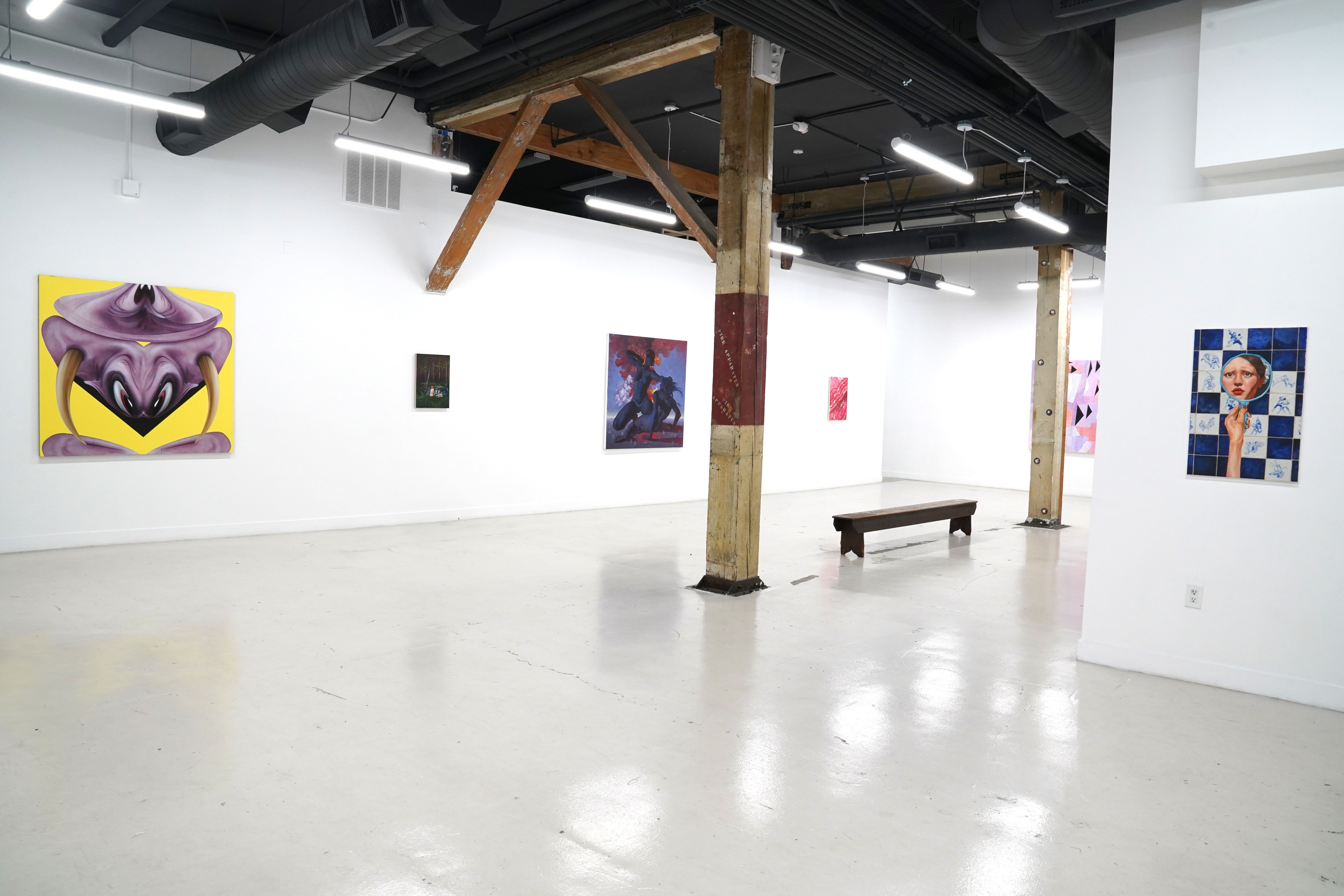 photo of a crowd of people in the art gallery