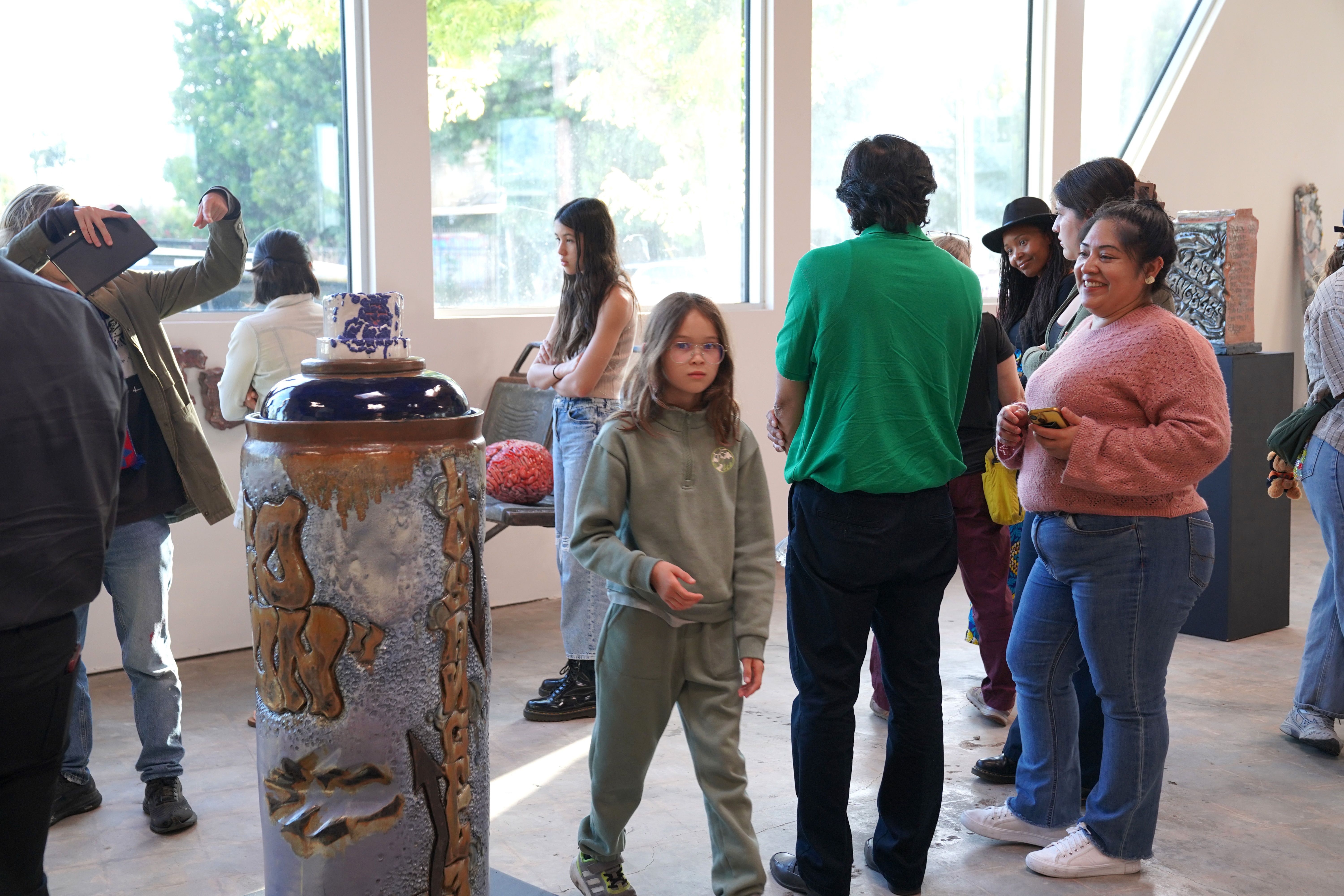 photo of the art gallery with paintings on the walls