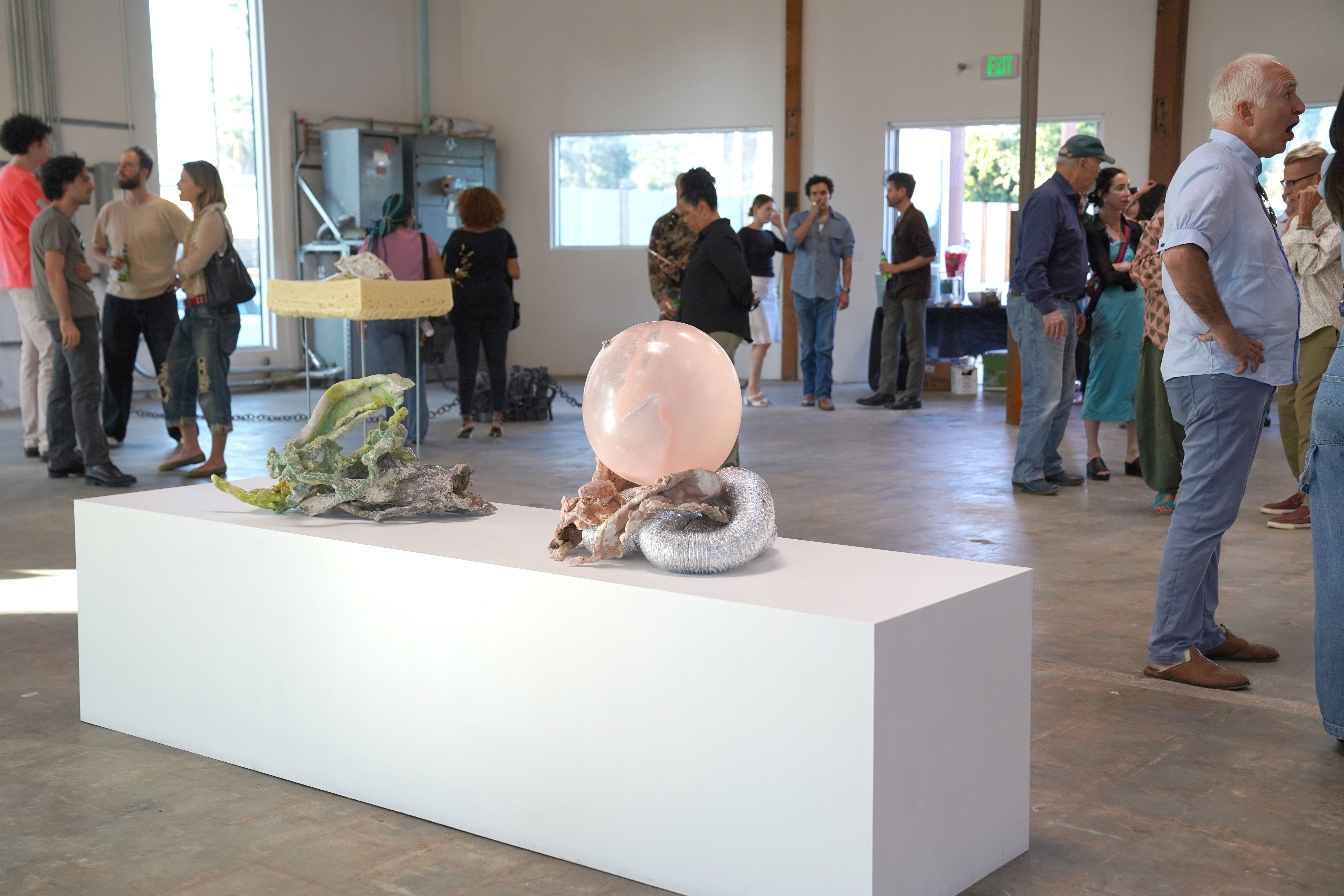 photo of the art gallery with paintings on the walls