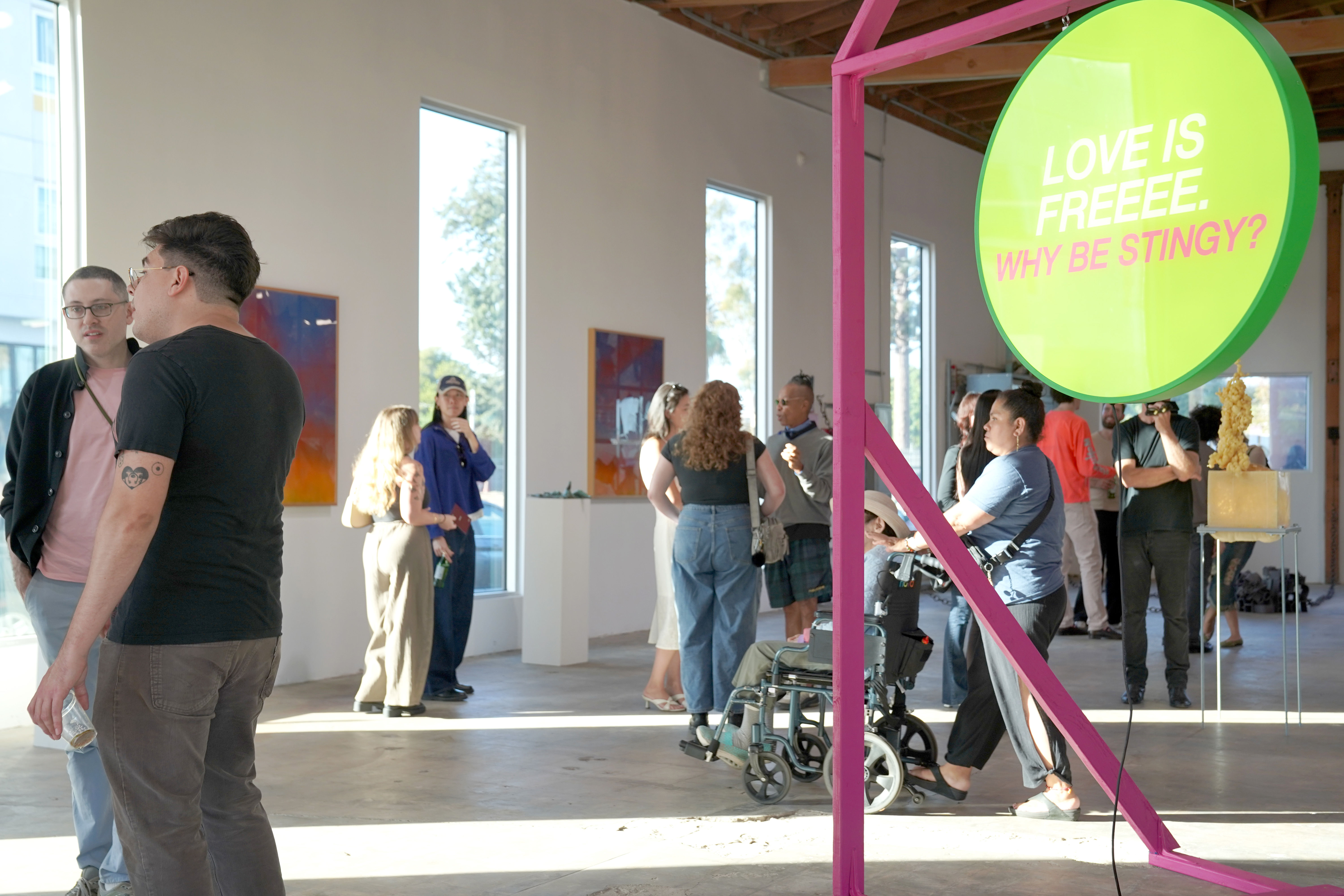 photo of the art gallery with paintings on the walls