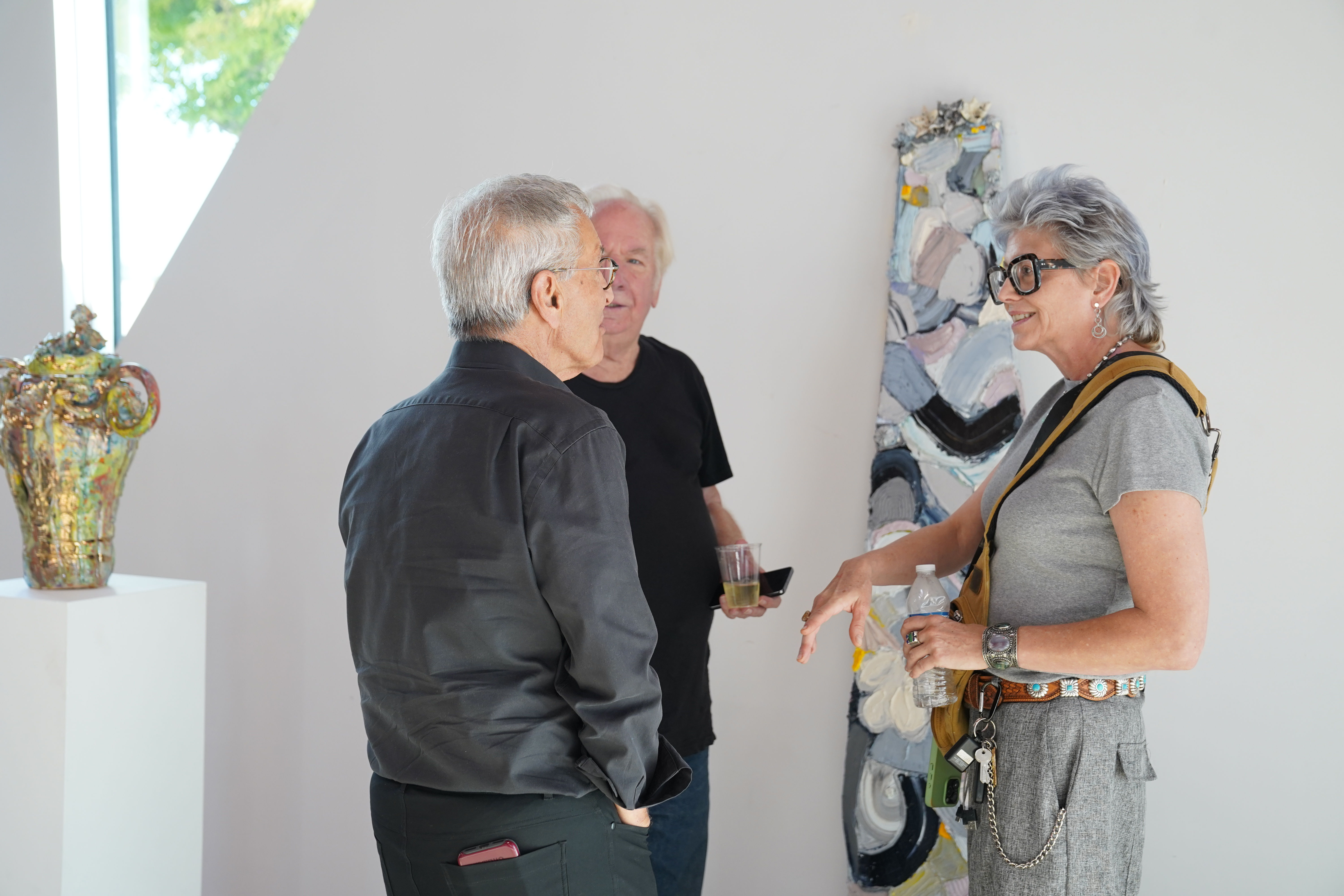 photo of the art gallery with paintings on the walls