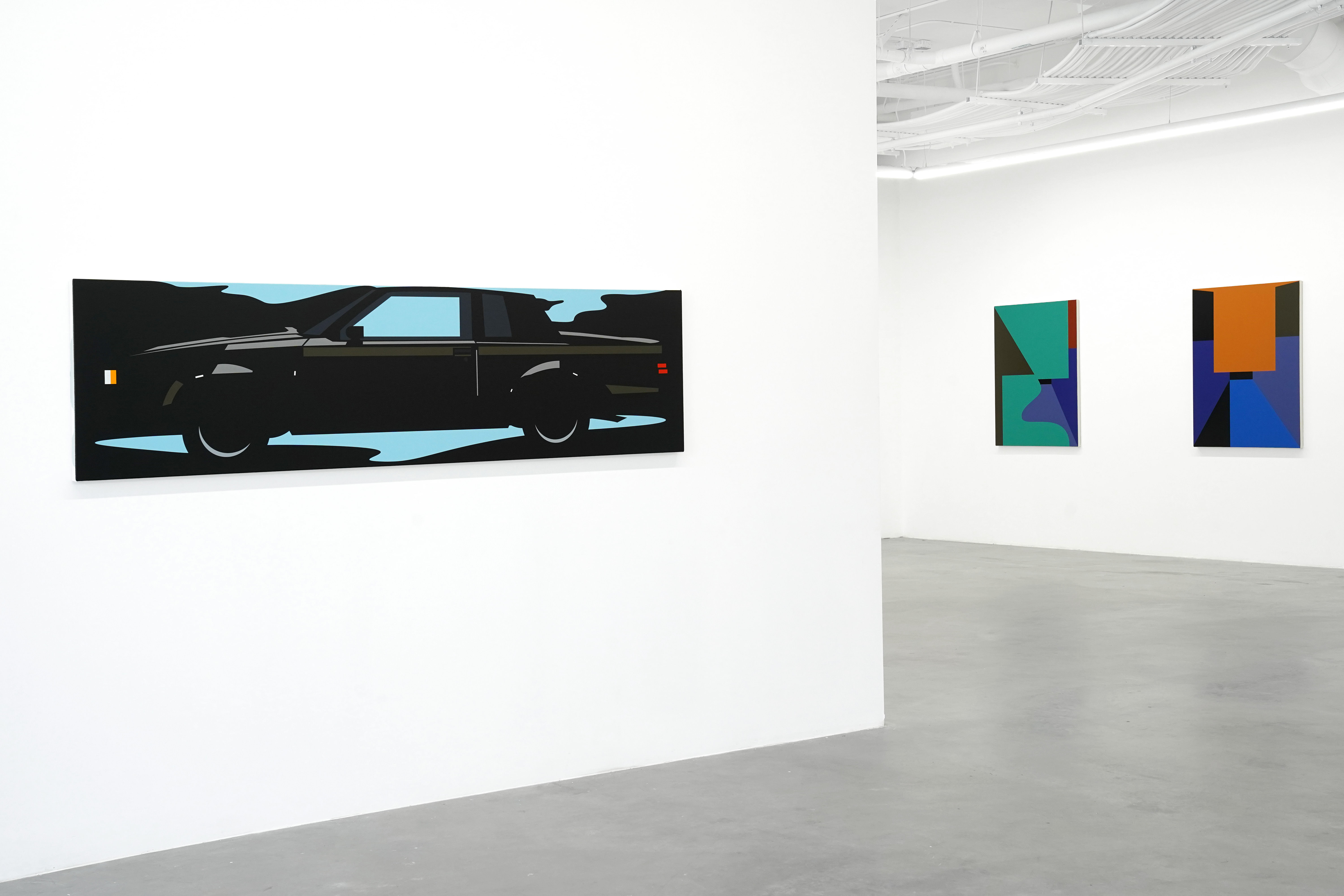 photo of the art gallery with paintings on the walls