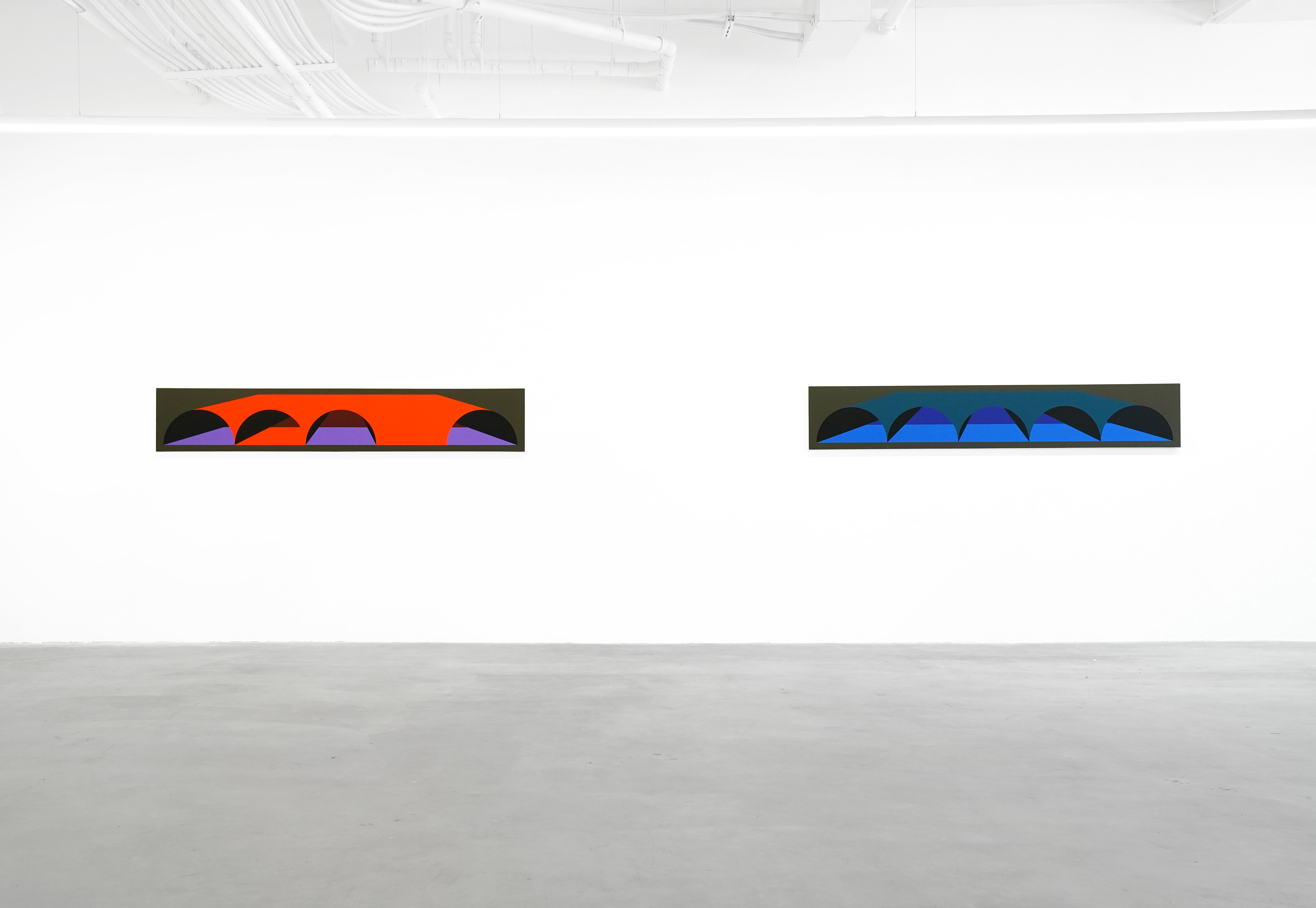 photo of the art gallery with paintings on the walls