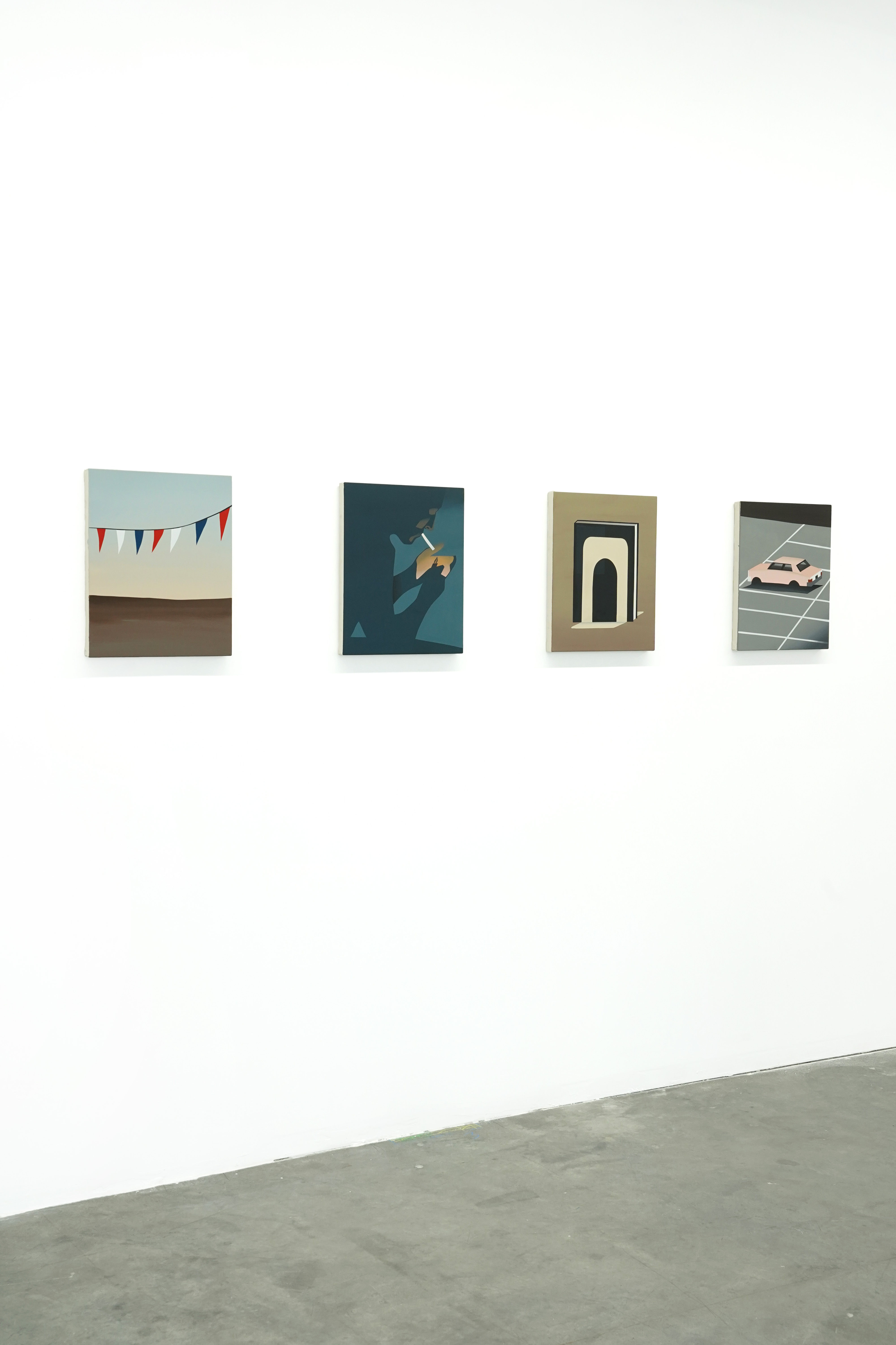 photo of the gallery with paintings hangiing on the wall