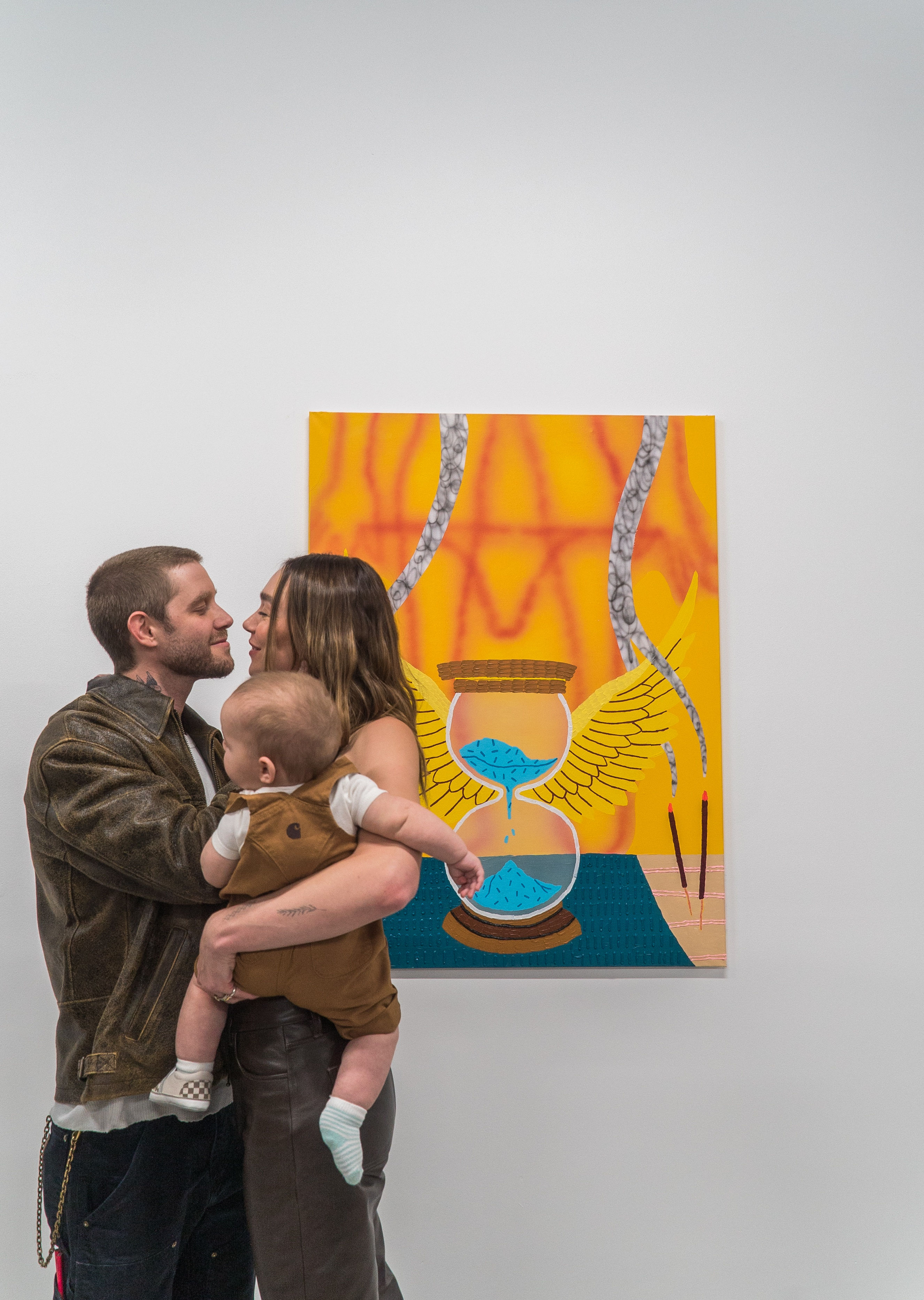 photo of artist Nico Bassill, his wife Emma Bassill and baby Leo