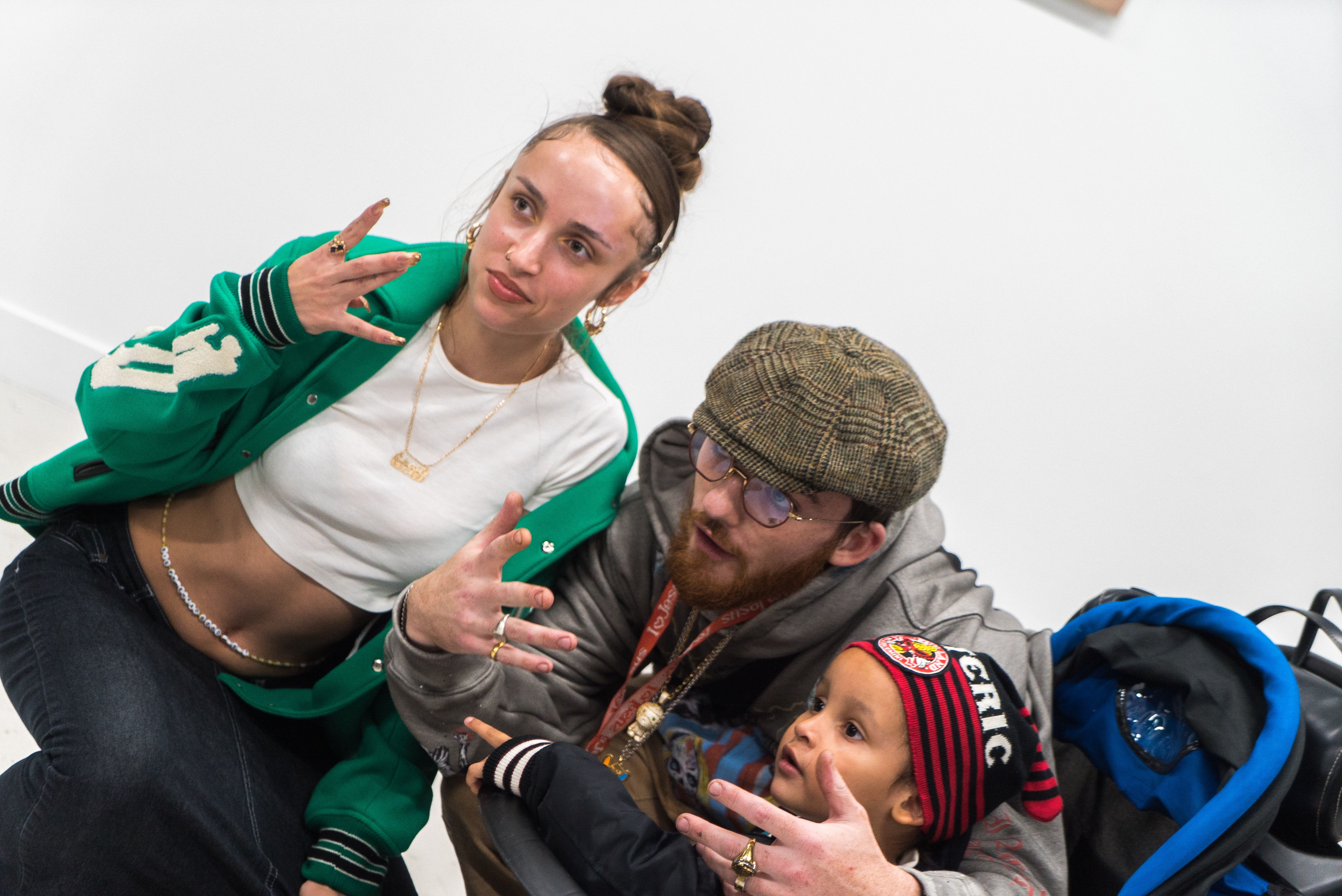 photo of Angus Cloud posing with a friend in the art gallery