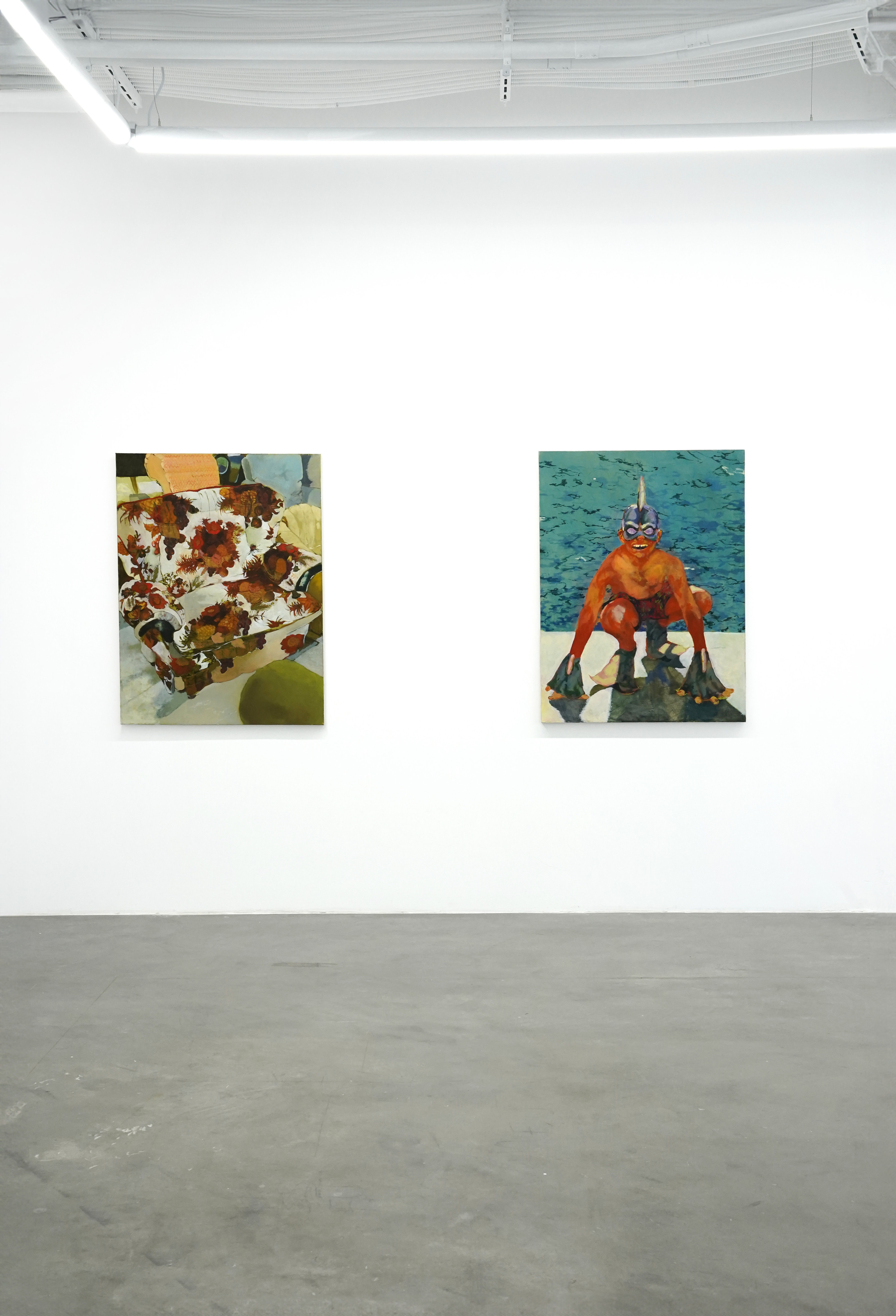 photo of the gallery with paintings hangiing on the wall