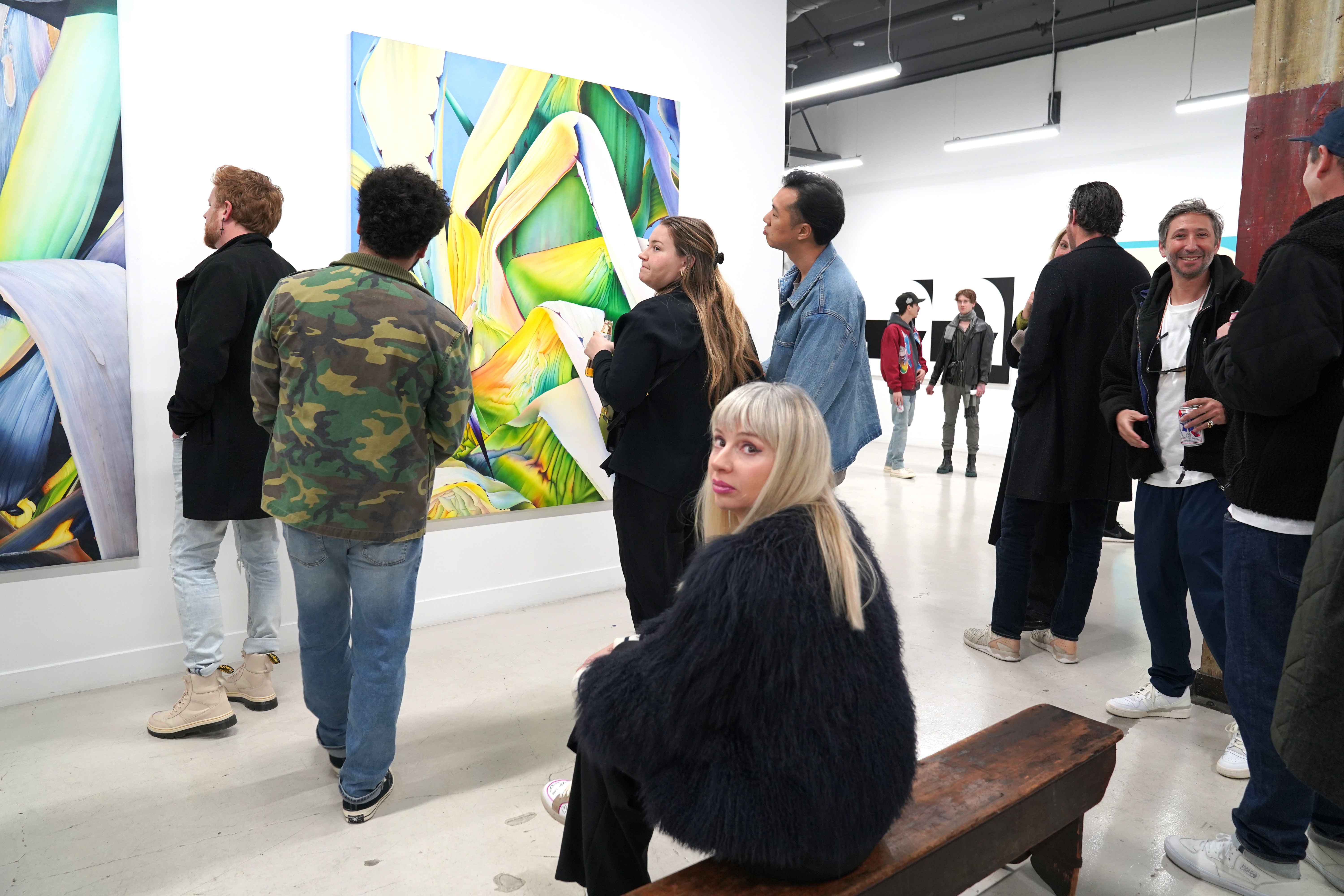 installation image of Adele Renault and Chad Hasegawa paintings in the gallery