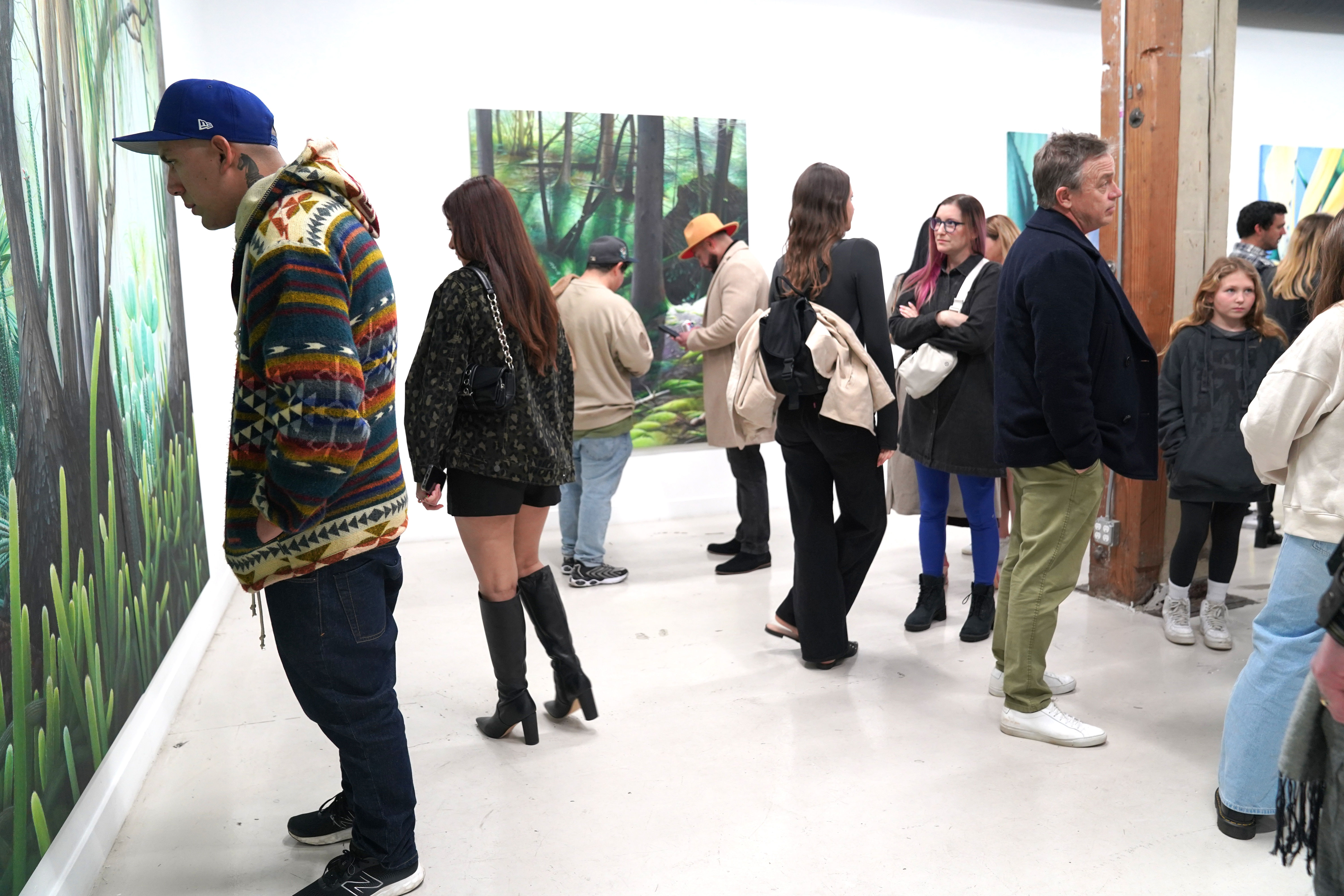 installation image of Adele Renault and Chad Hasegawa paintings in the gallery