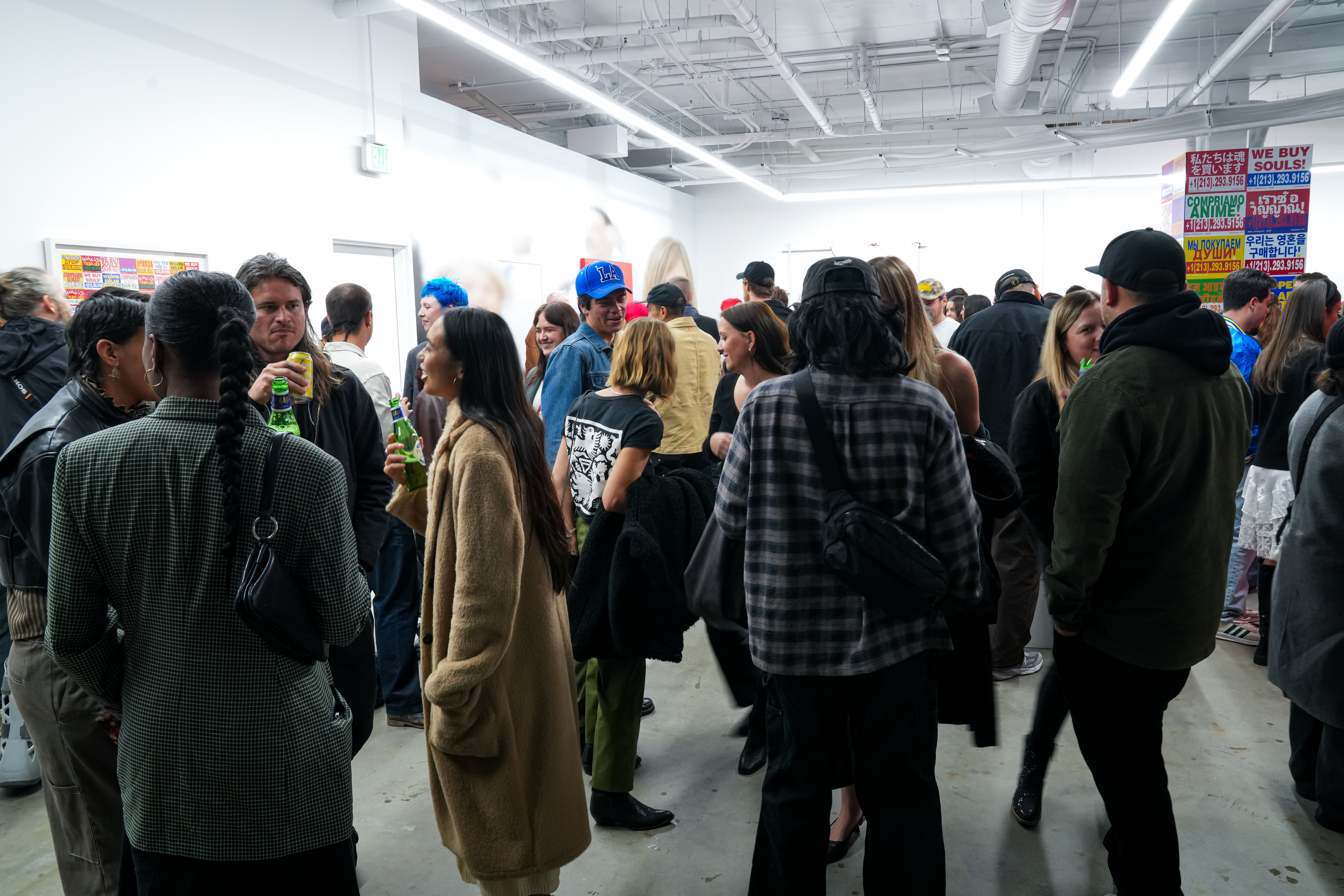 photo of the art gallery with paintings on the walls