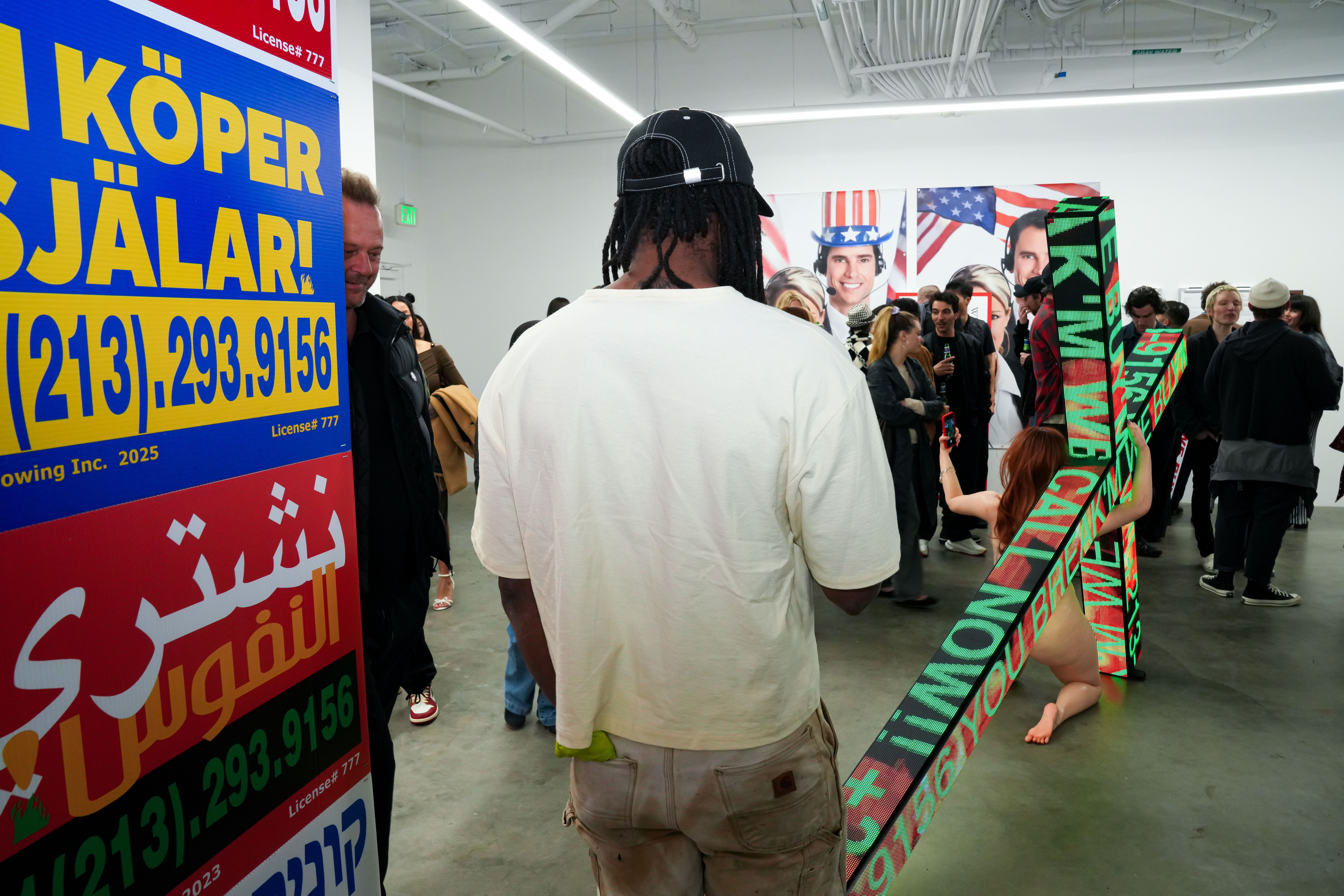 photo of the art gallery with paintings on the walls