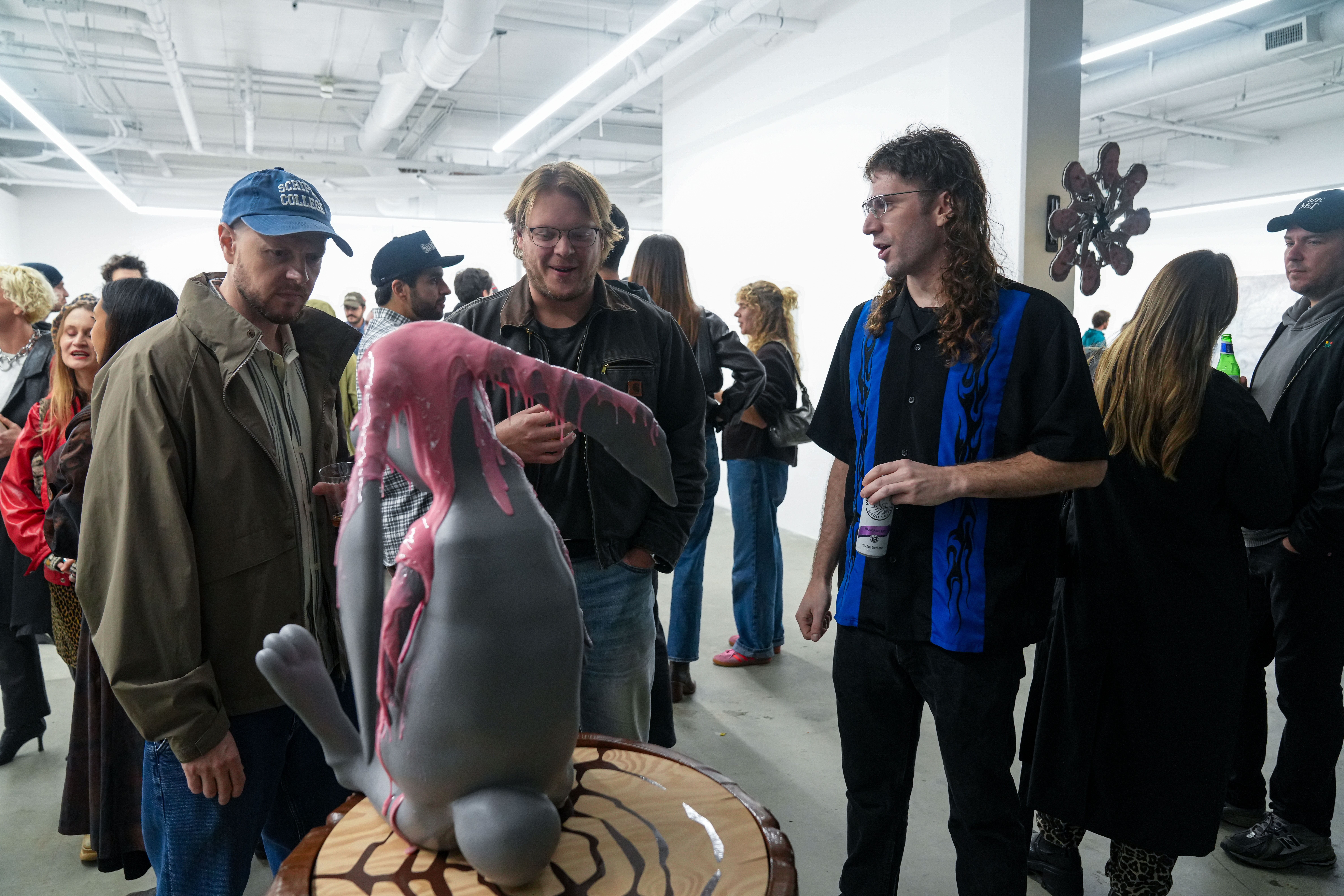 photo of the art gallery with paintings on the walls