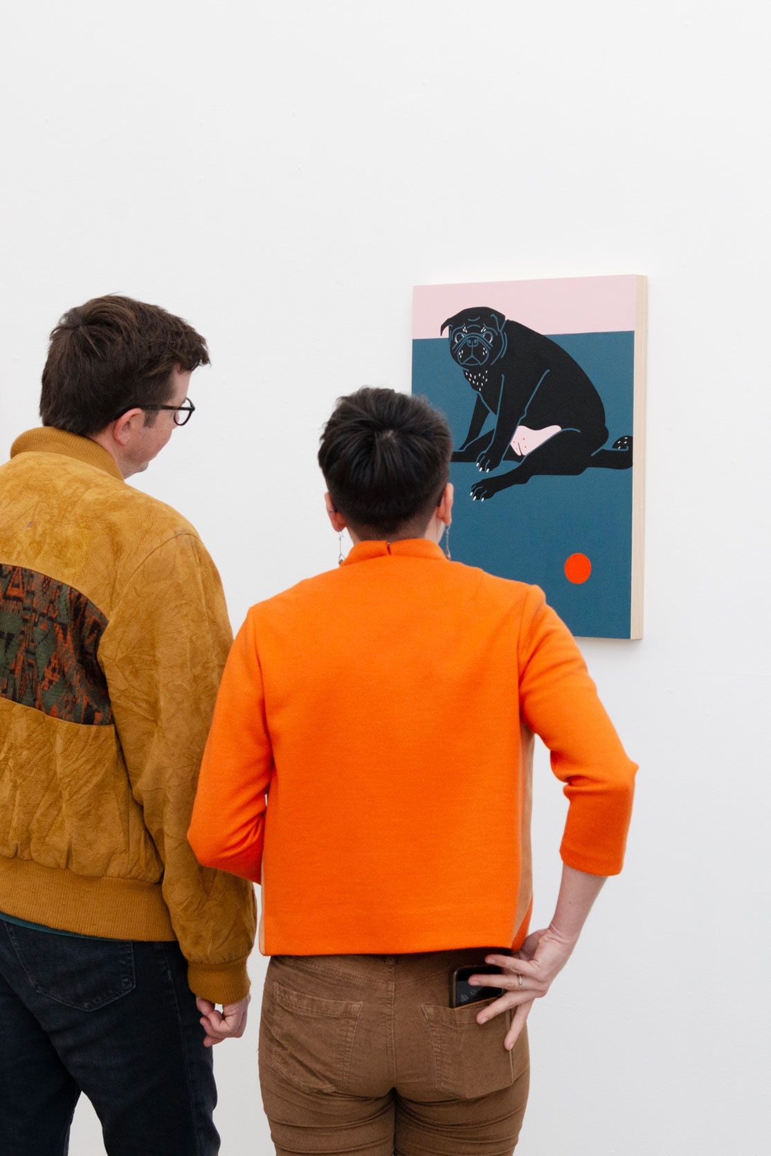 Photo of people look at Jillian Evelyn's painting Olie