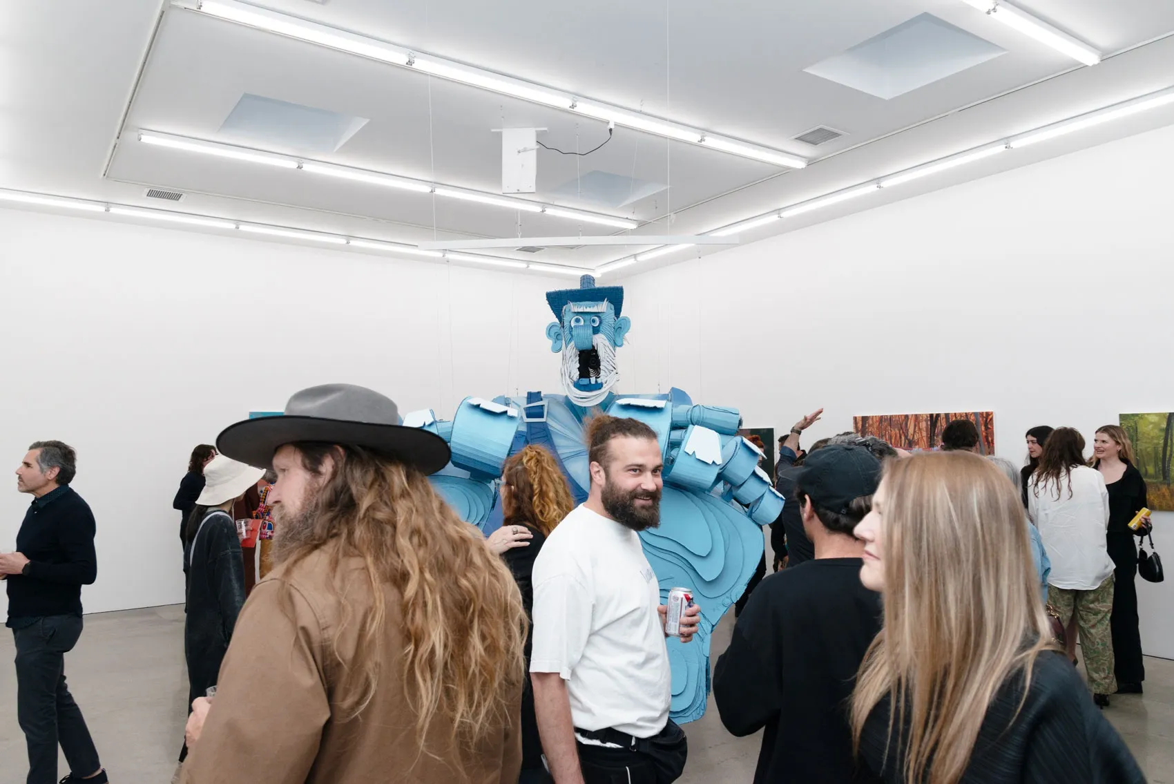 People at the opening reception for Wayne White's solo exhibition at Hashimoto Contemporary Los Angeles.