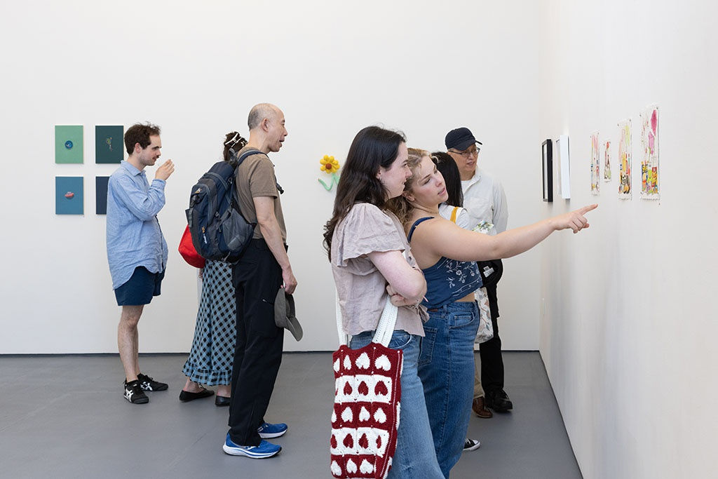 crowd at the amuse-bouche opening reception