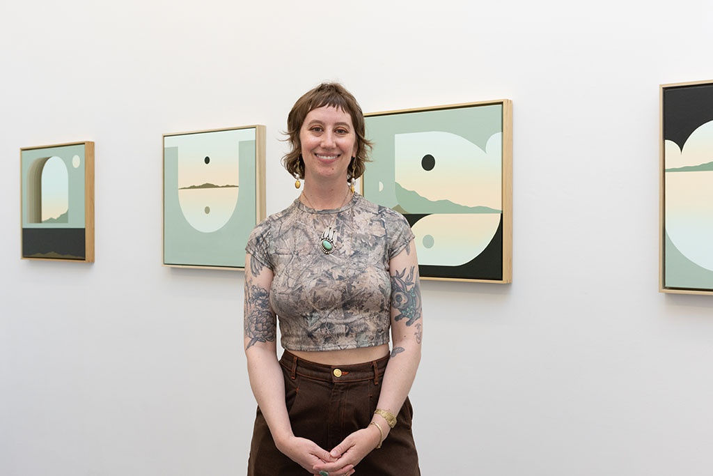 Artist Madeleine Tonzi with her work