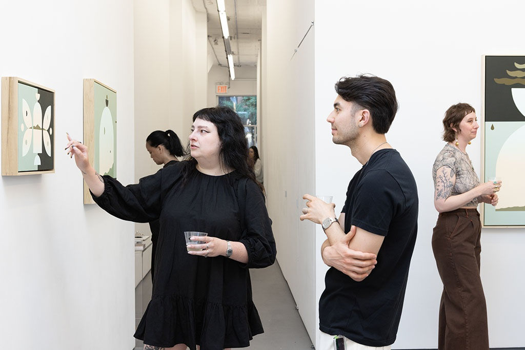 people looking at art at Opening of Madeleine Tonzi's the moon underwater