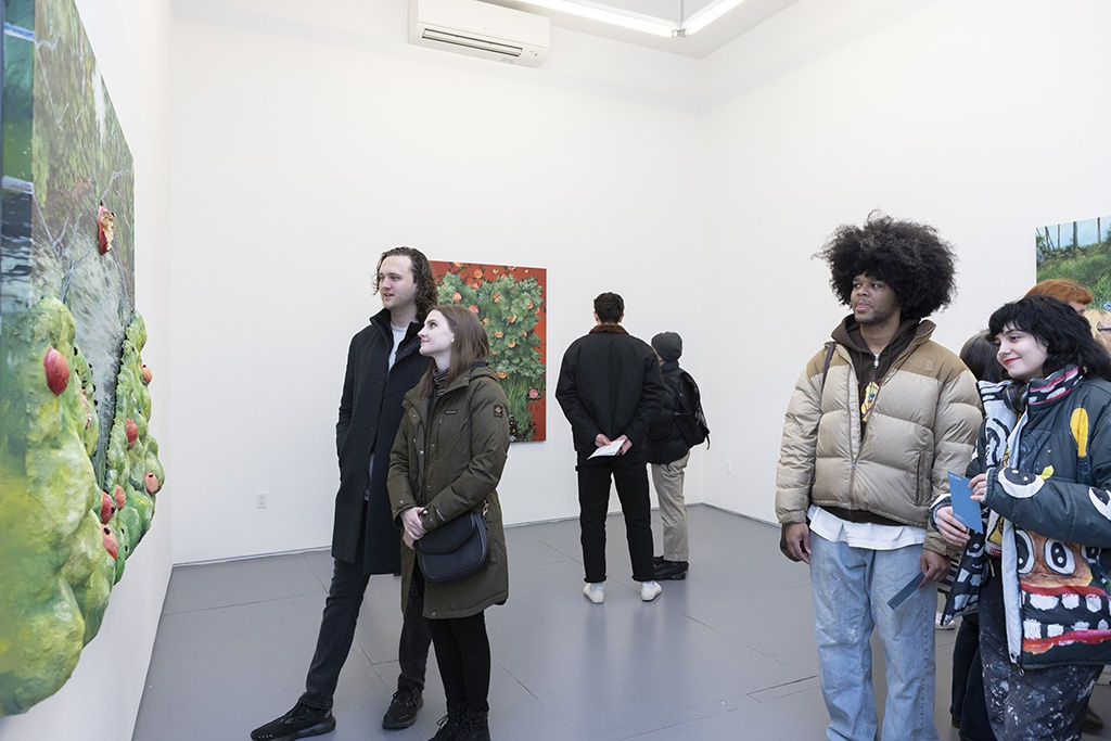 people attending Nic Dyer exhibition