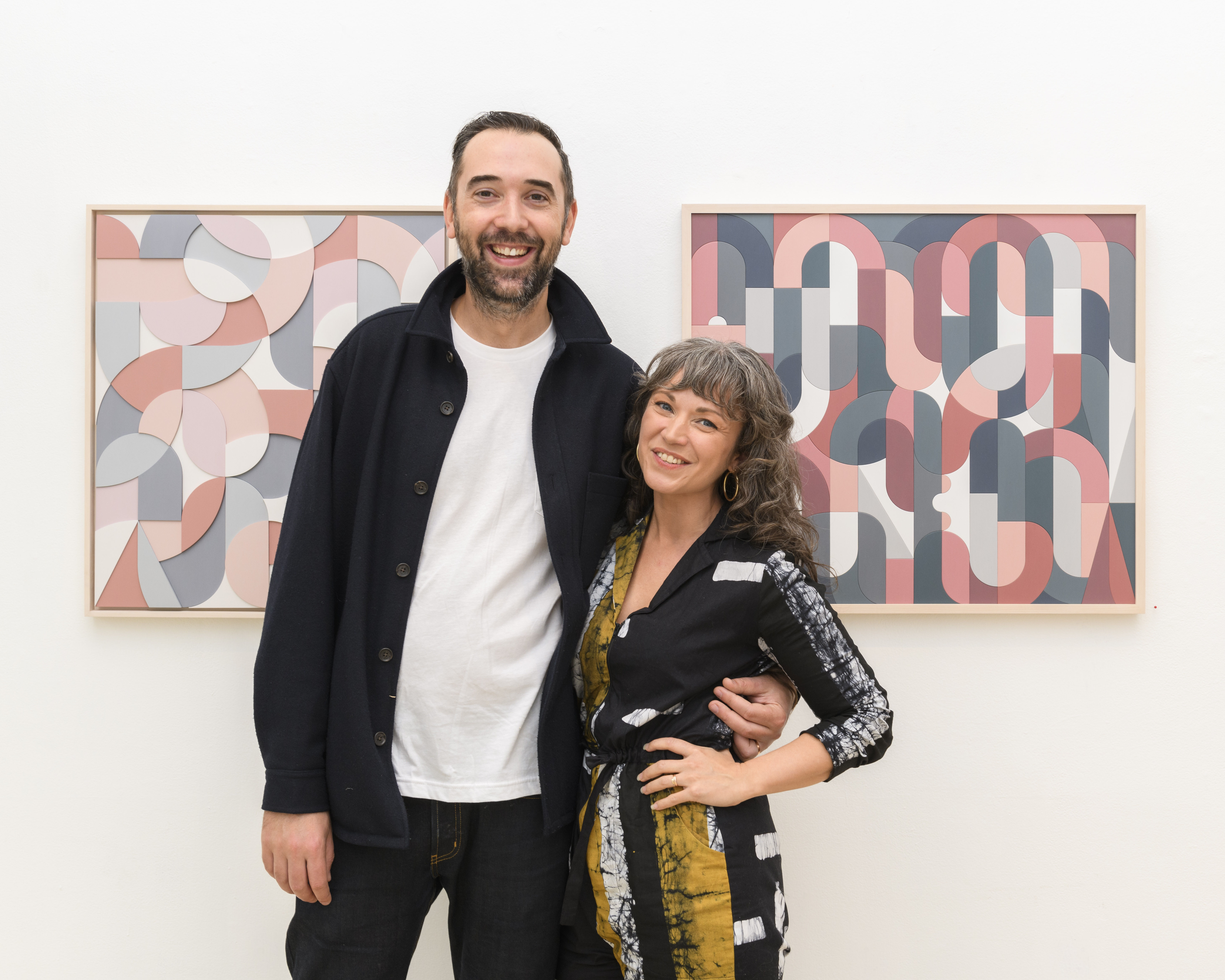 Scott Albrecht and his partner at his opening reception