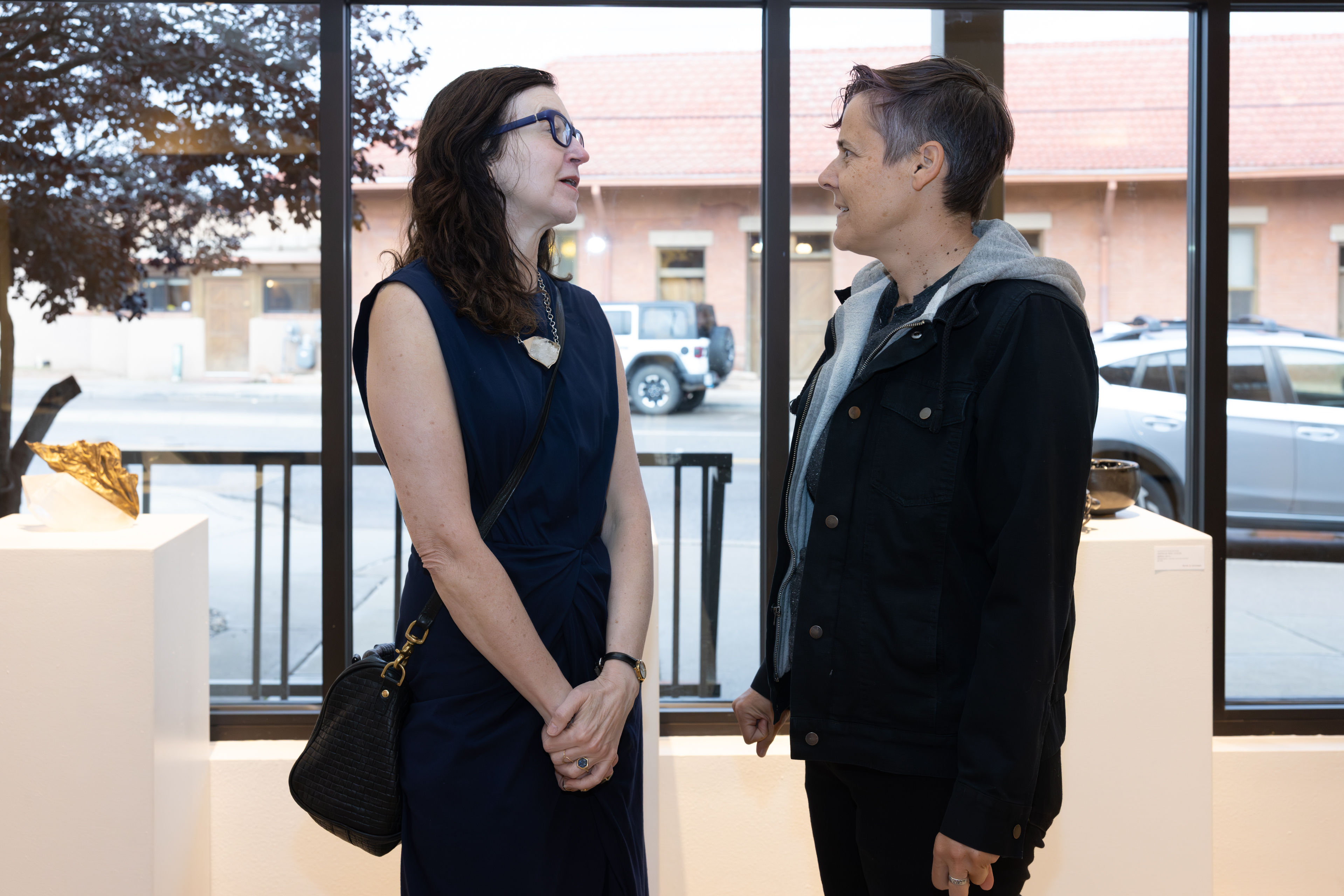 Two artists talking to each other