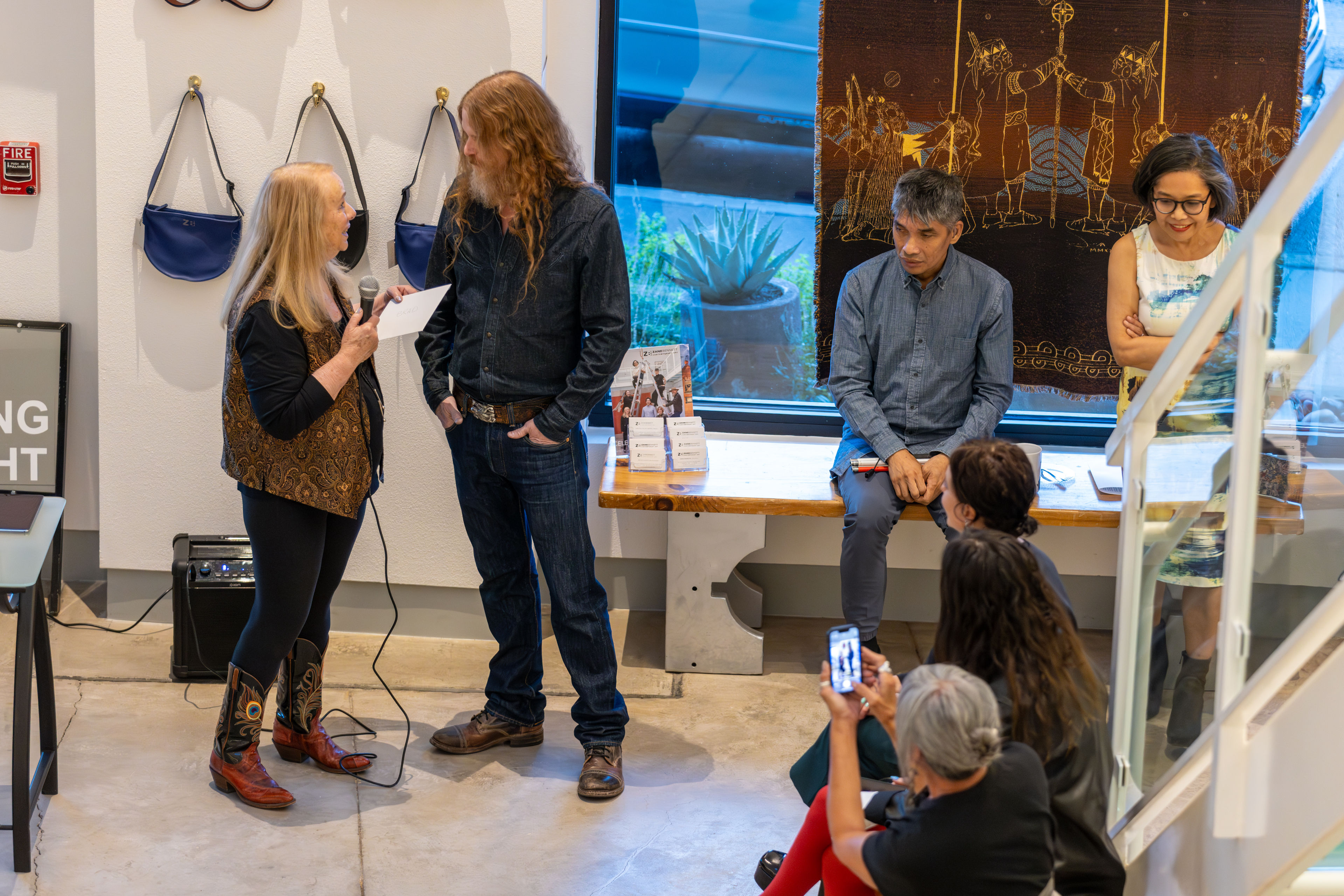 Woman on microphone speaking