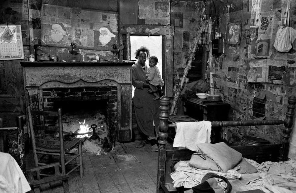 Bruce Davidson, Untitled, Time of Change (Mrs. Blackman in Cabin holding Baby Trickum Forks, Alabama), 1965