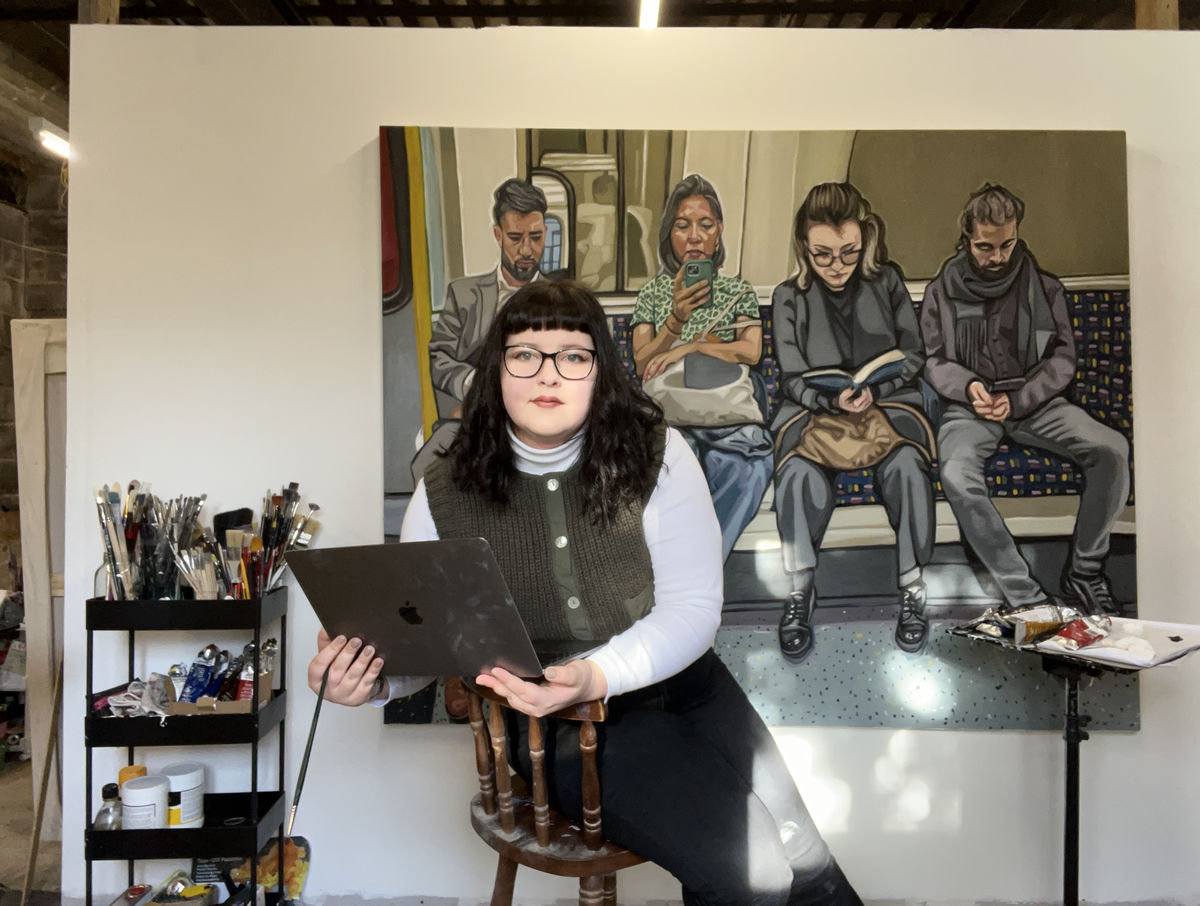 Photo of artist Emily Gillbanks in her studio