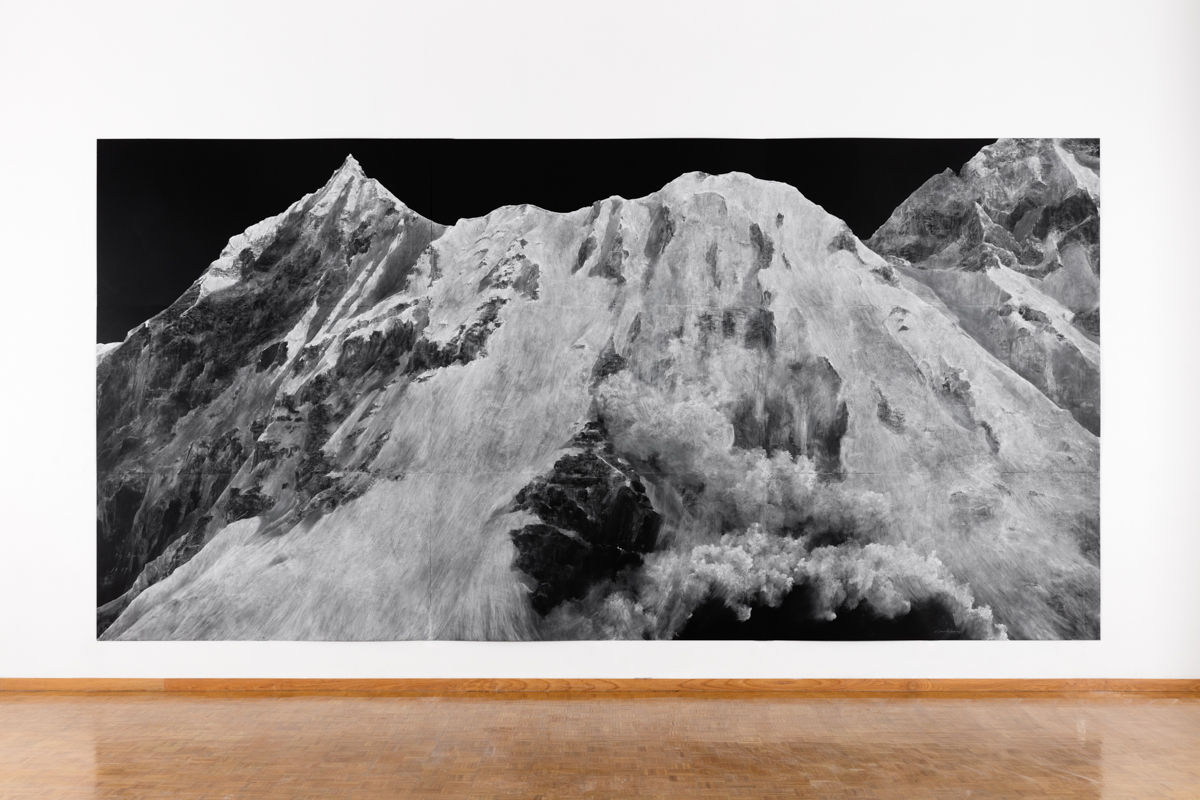 An image containing a chalk-on-blackboard work by Tacita Dean, depicting a mountain