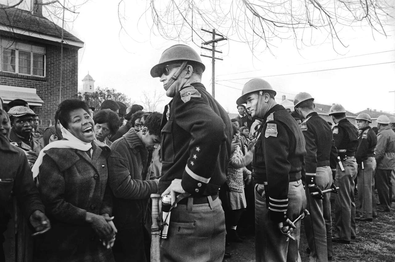 Steve Schapiro, Selma Demonstrator and Troops, 1965