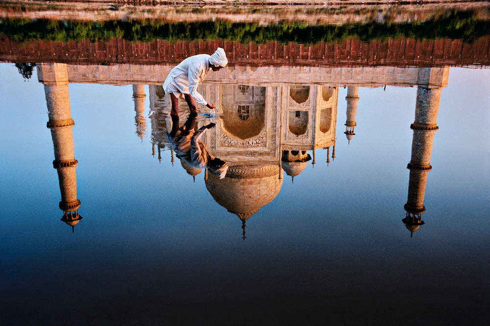 Steve McCurry, Man and Taj Reflection, Agra, India, 1999