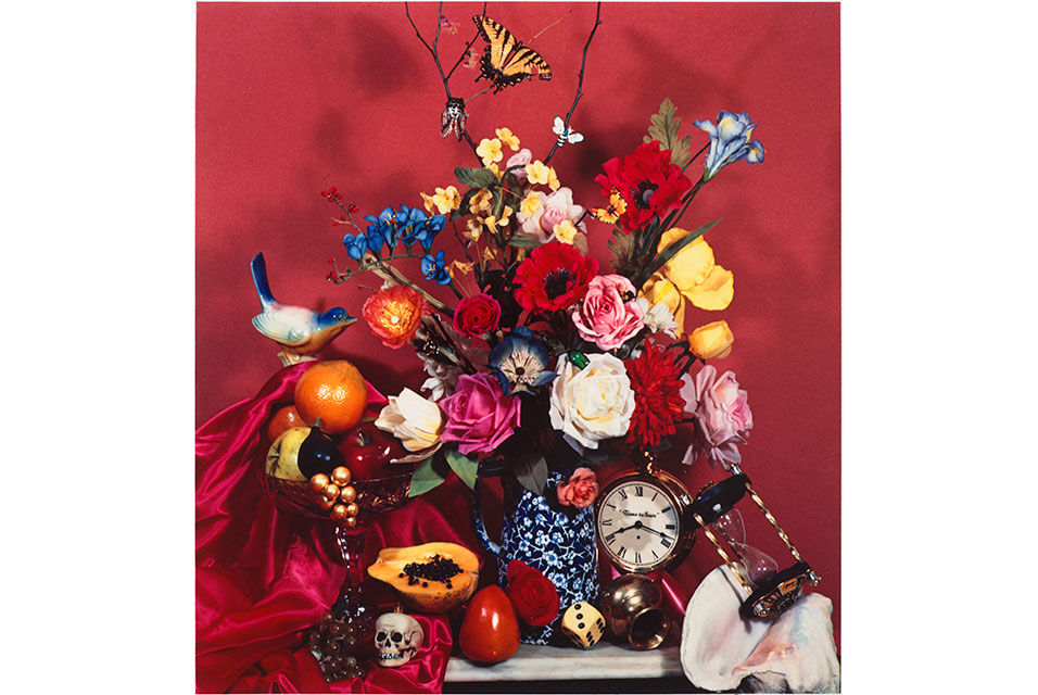 Audrey Flack, Time To Save, from the 1984 portfolio "Audrey Flack: 12 Photographs 1973 to 1983," 1979, dye transfer print, 39/50. 20 x 18 1/2 inches (image); 24 x 20 inches (paper), Gift of Stephen L. Singer and Linda G. Singer. Photograph by Clements Pho