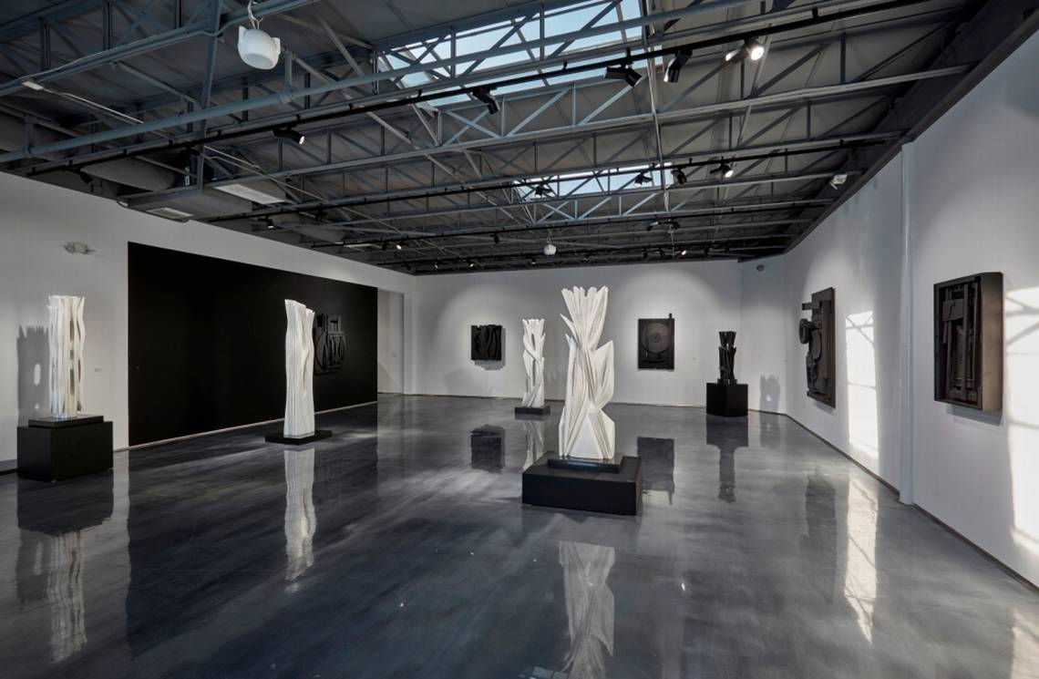 At Atchugarry Art Center, “Dialogue in Black and White” juxtaposes black wood sculptures by Louise Nevelson and white marble sculptures by Pablo Atchugarry through March 30, 2020.