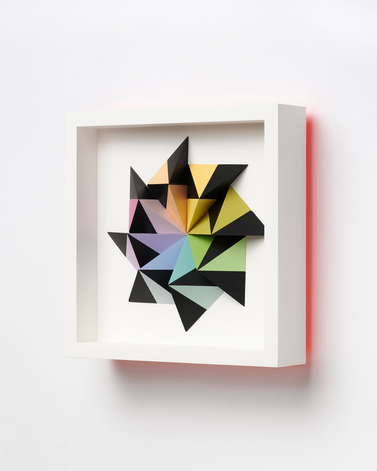 wooden geometric wall sculpture by Sean newport - rainbow