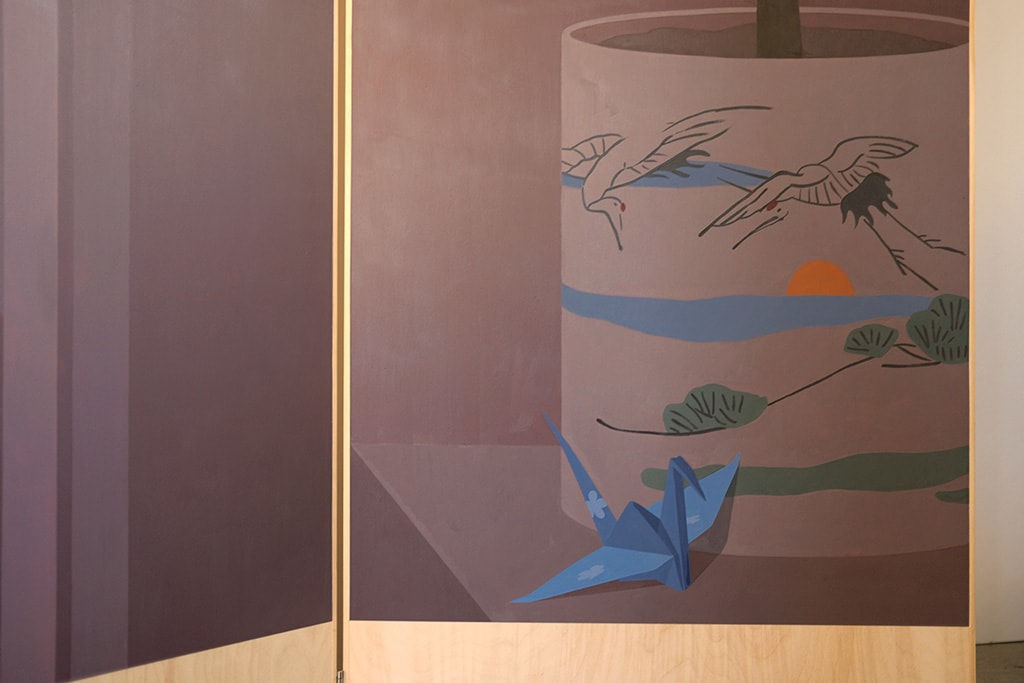 detail of a painting on a wooden room divider by artist Adrian Kay Wong depicting layered composition of an interior setting with two individuals sitting at a table, obscured by a partially opened door and door frame respectively