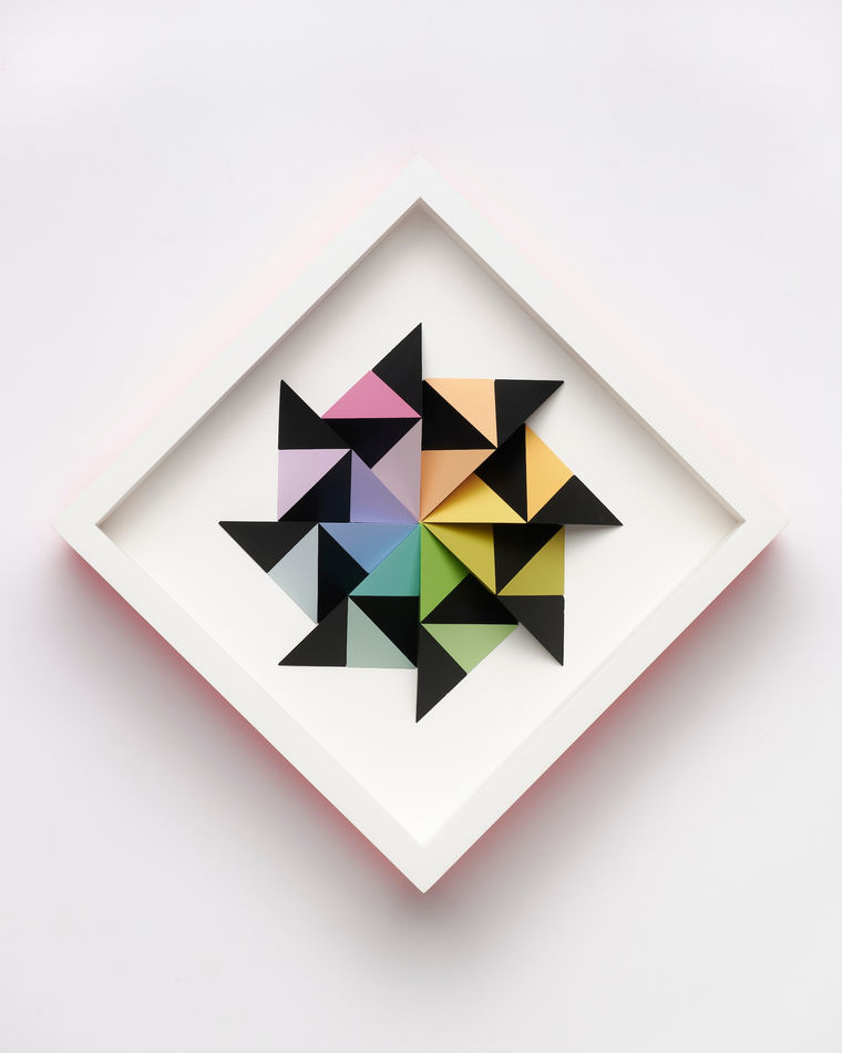 wooden geometric wall sculpture by Sean newport - rainbow