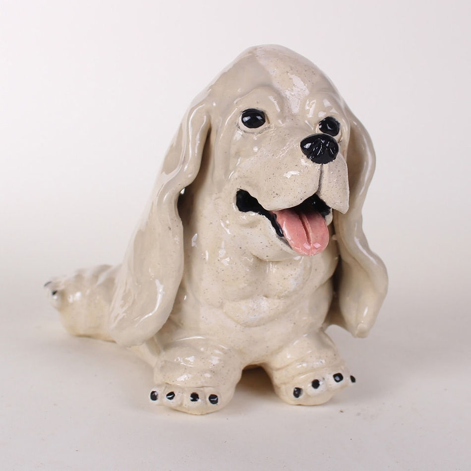 Katie Kimmel - ceramic sculpture of a white basset hound