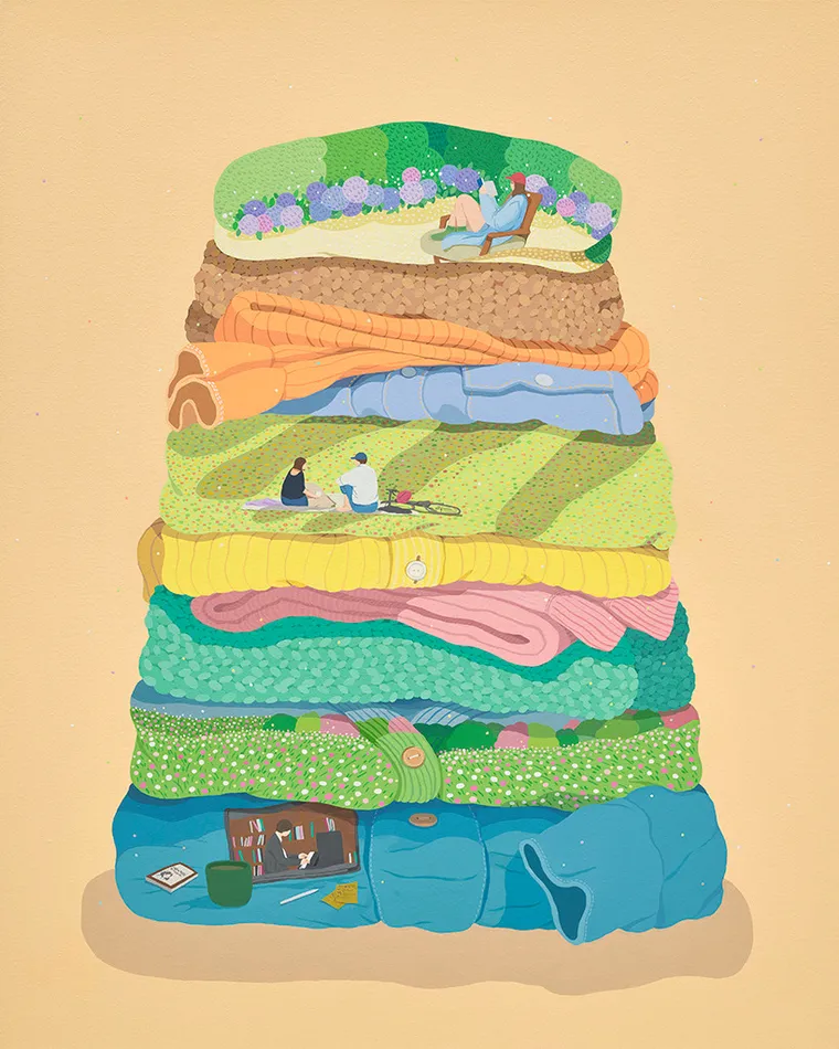 a pile of folded laundry with smaall scenes hidden in the folds on a light orange background