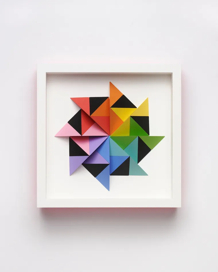 wooden geometric wall sculpture by Sean newport - rainbow
