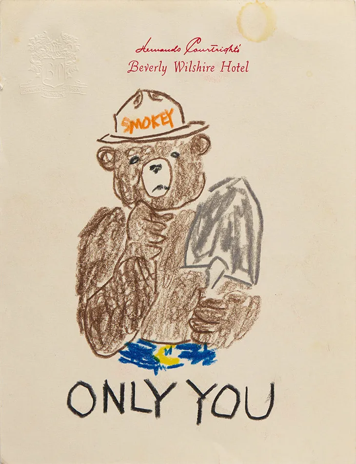 Drawing of Smokey the Bear with the words Only You on hotel stationery
