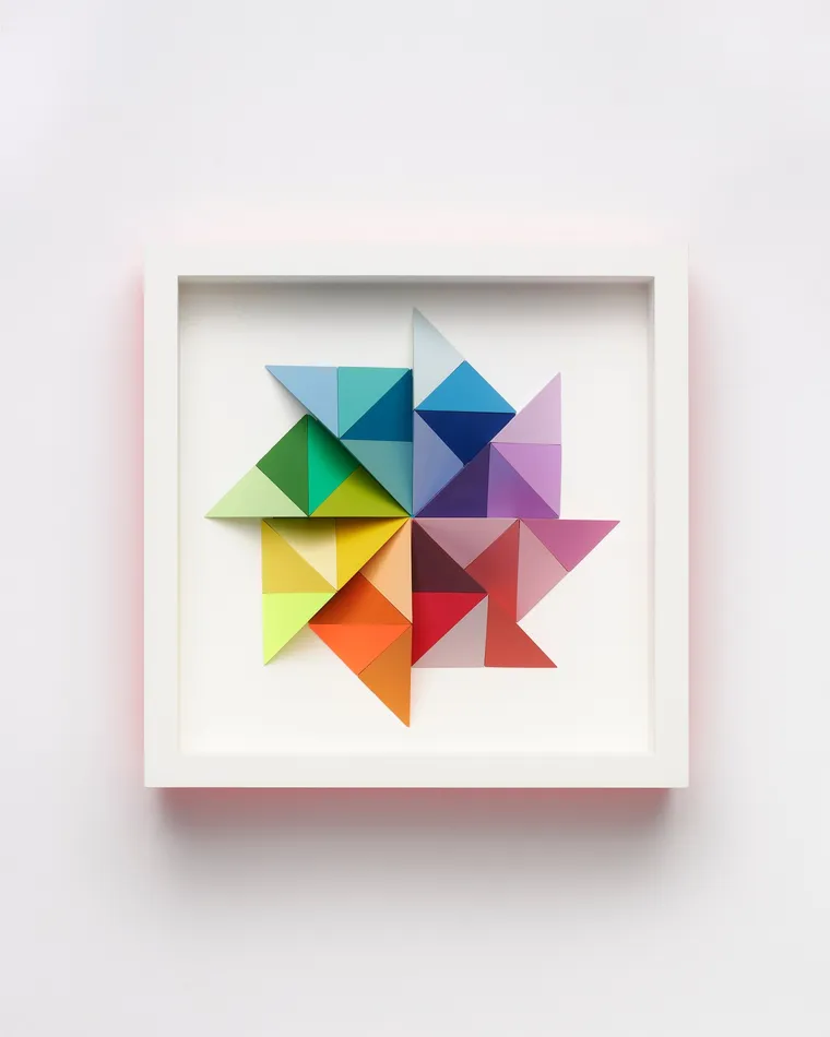 wooden geometric wall sculpture by Sean newport - rainbow